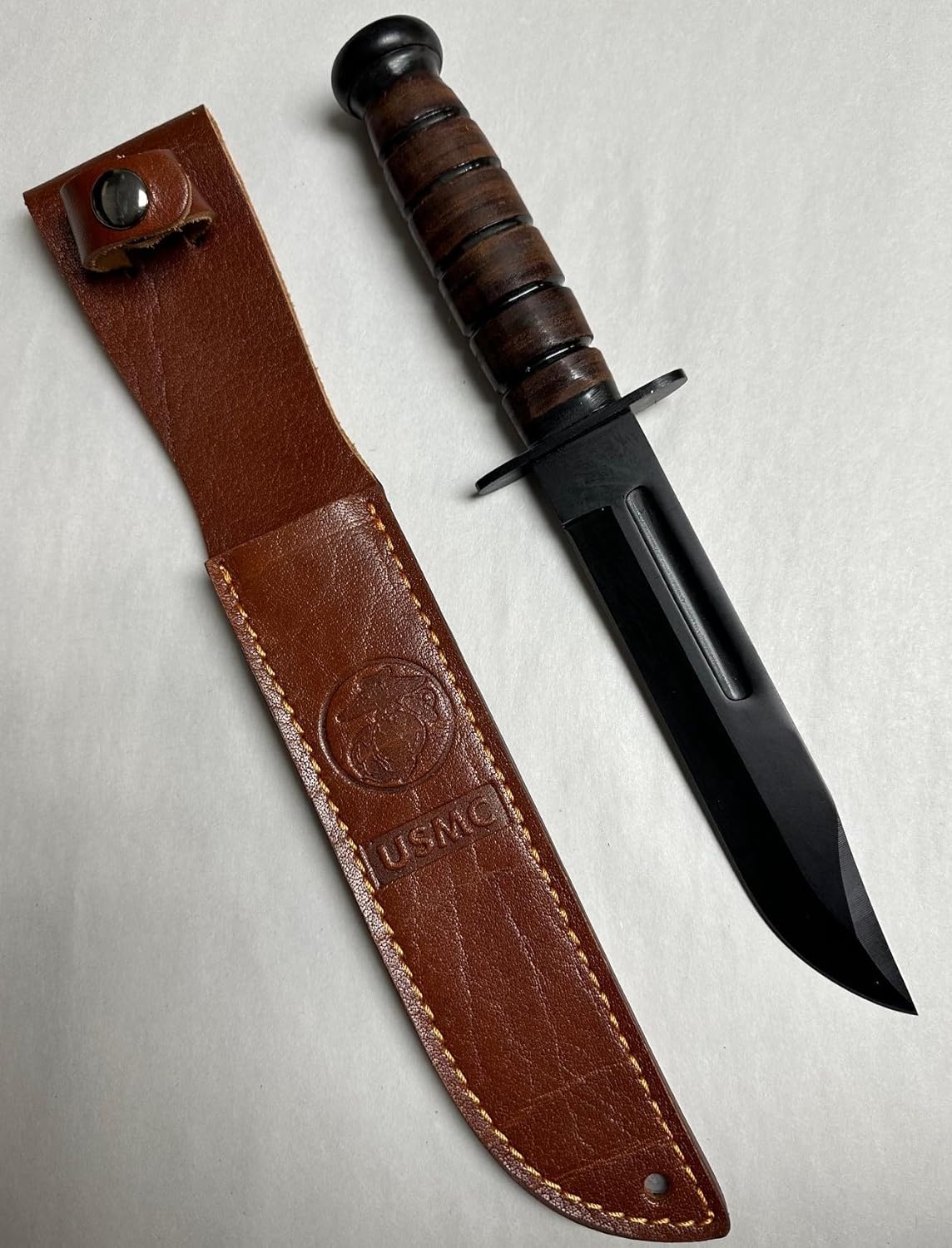 Knife USMC with Leather Scabbard. NORTHRIDGE INTERNATIONAL INC.