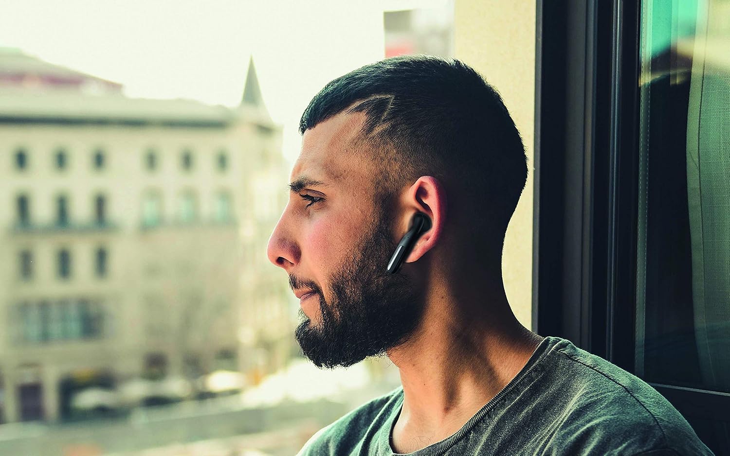 Person wearing a RYGHT Nemesis earbud