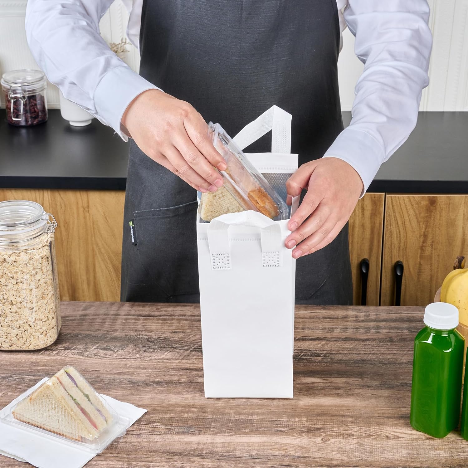 Restaurantware Insulated Delivery Bags 100 Count 4.72 x 3.94 x 11.02 Inches Nonwoven Take Out Bags For Food With Sturdy Handles, White Insulated Grocery Bags Tamper-Evident Foldable