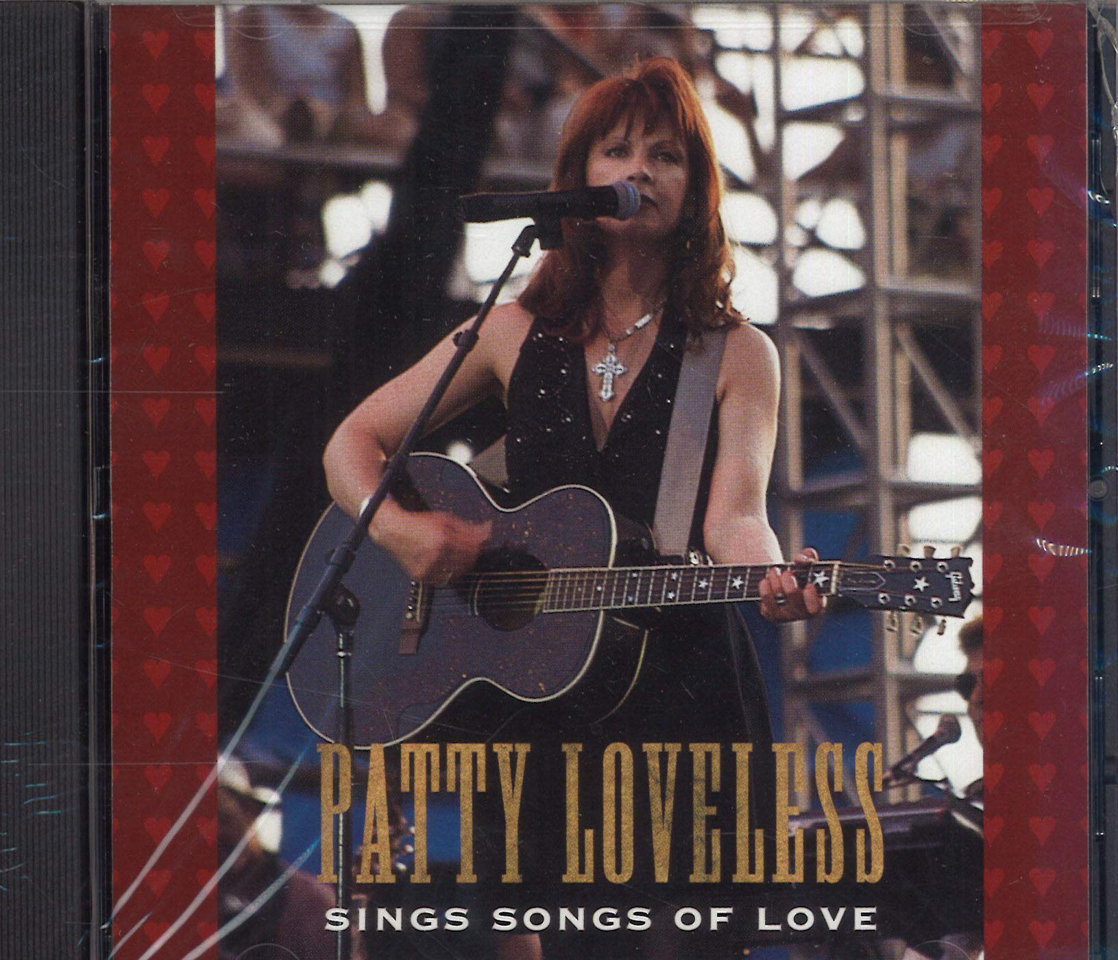 Sings Songs of Love [Audio CD]