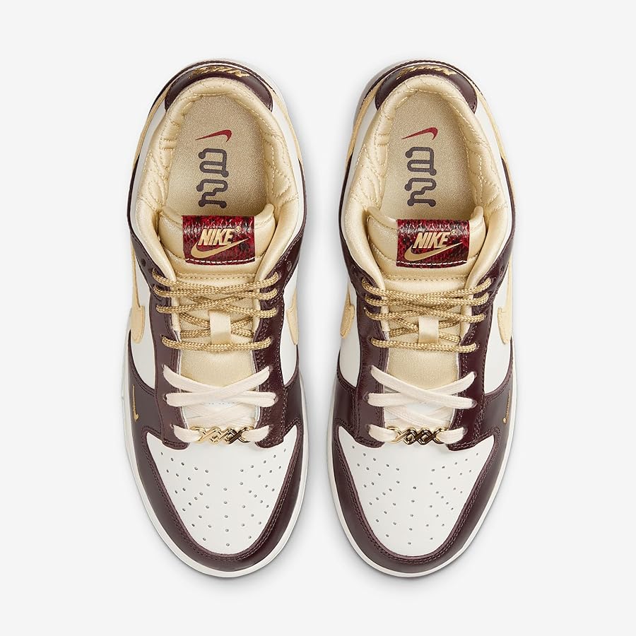 nike maroon and gold shoes