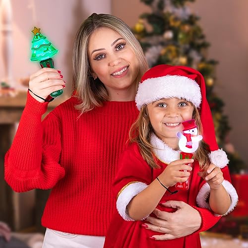 Miniatura 2 de ArtCreativity Varitas giratorias navideñas iluminadas  Juego de 4 varitas de Navidad giratorias para niños con LED multicolor  4 diseños festivos