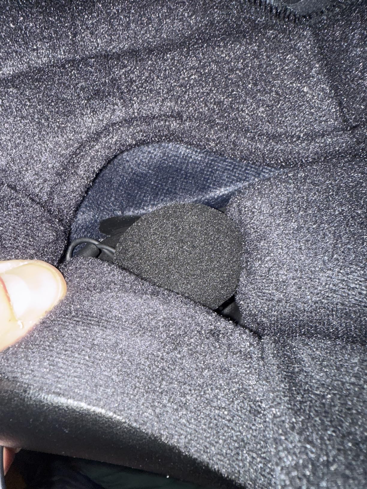 Image showing the internal wiring and speaker placement within a helmet for the JX01 headset, with wires neatly tucked away.