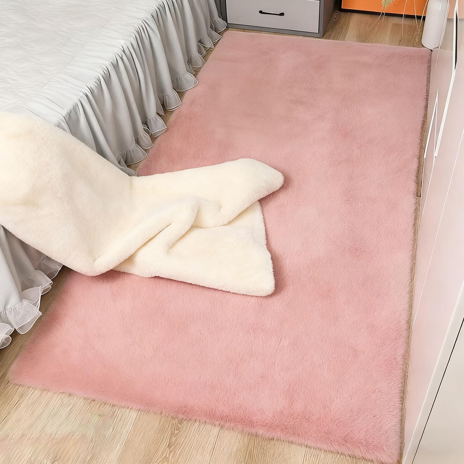 Tapis moderne doux rose unicolore aux finitions soignées pour bureau