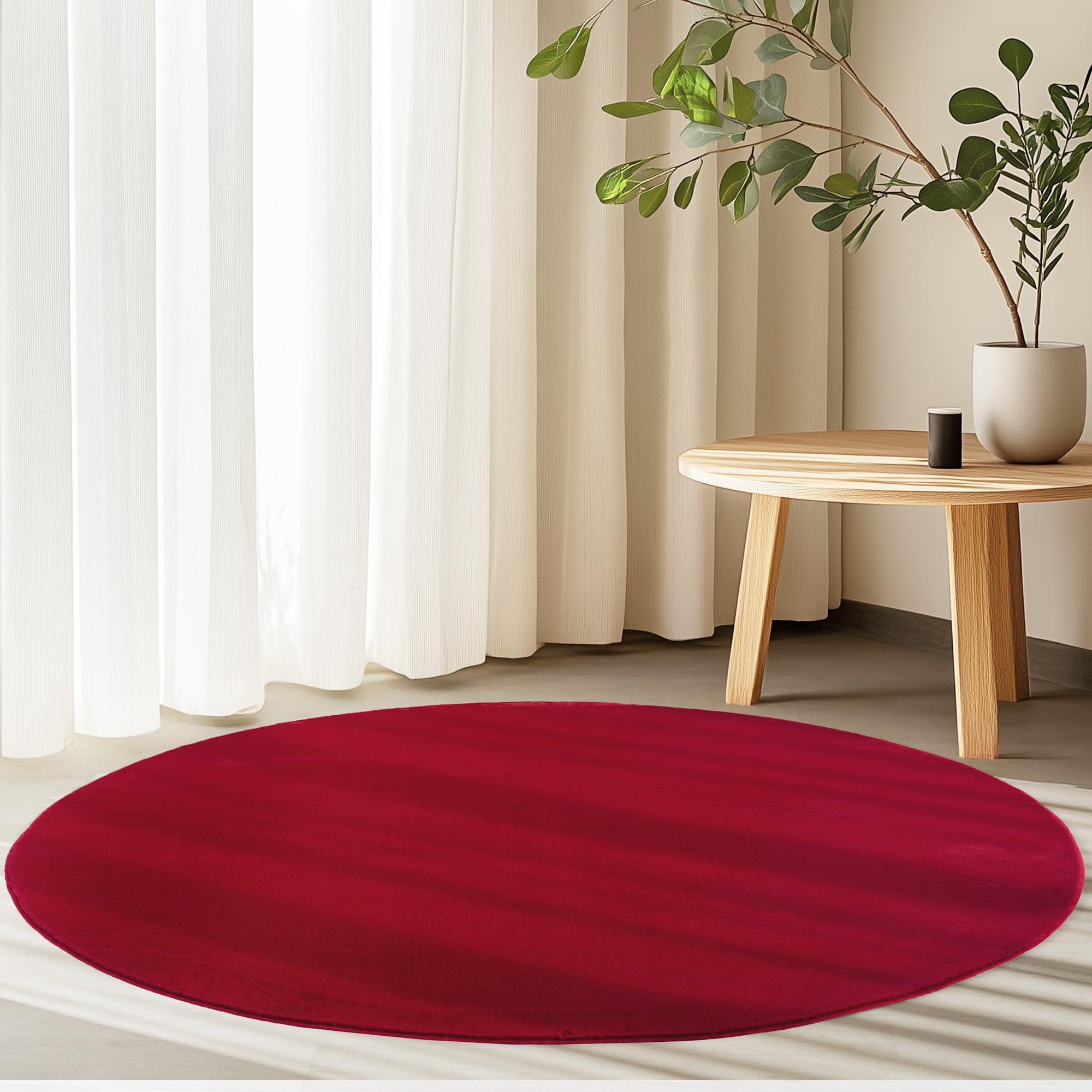 Tapis rond rouge lavable et doux pour une chambre douillette