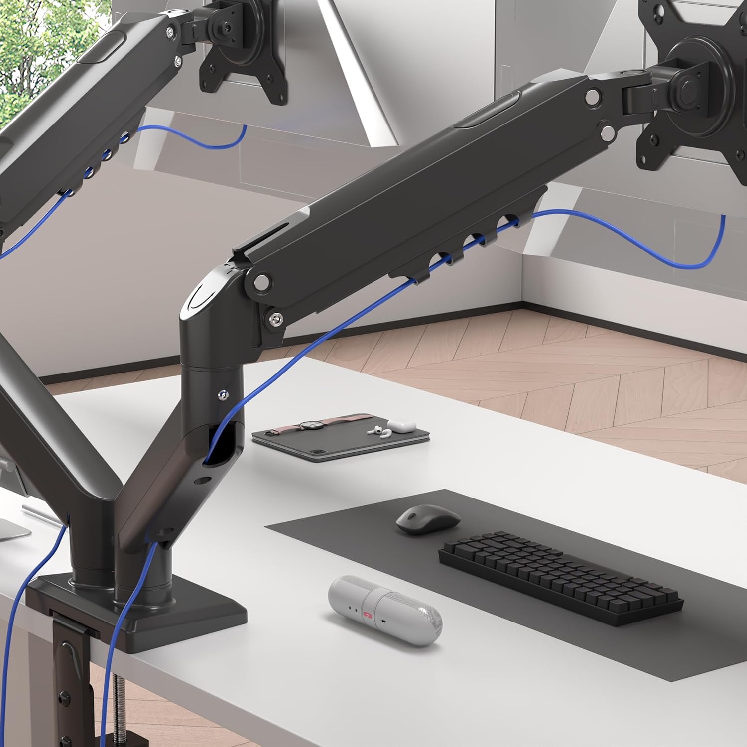 Monitor arm with cables neatly routed through integrated cable management