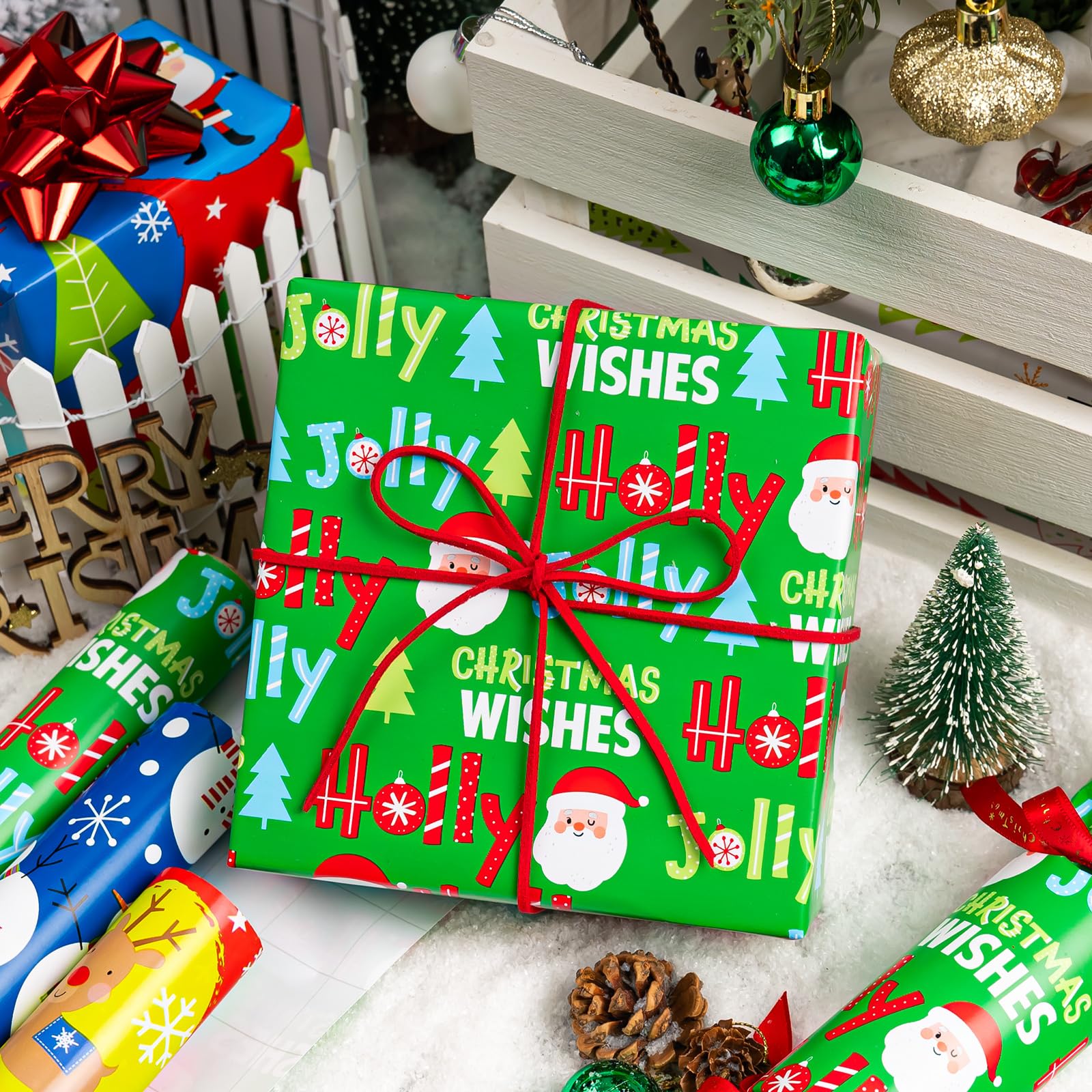 Yarcony Divertido paquete de 3 papeles de regalo de Navidad, 17 pulgadas x 10 pies por rollo, vibrante Papá Noel, muñeco de nieve, pingüino, papel de regalo surtido de invierno para Navidad