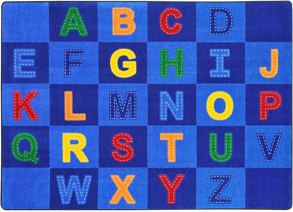 Joy Carpets Kid Essentials Patchwork Letters 5'4" x 7'8" Area Rug in Color Multi