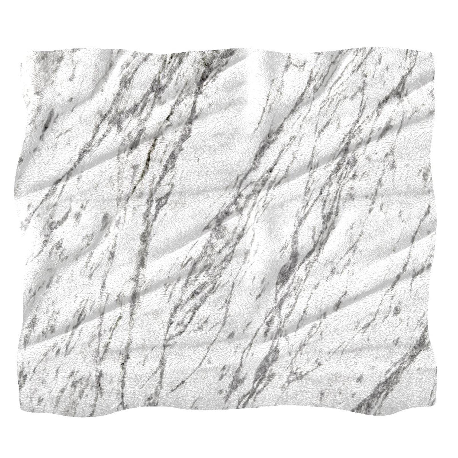 Couverture de lit douillette et couvre-lit marbré pour des moments cocooning dans la chambre