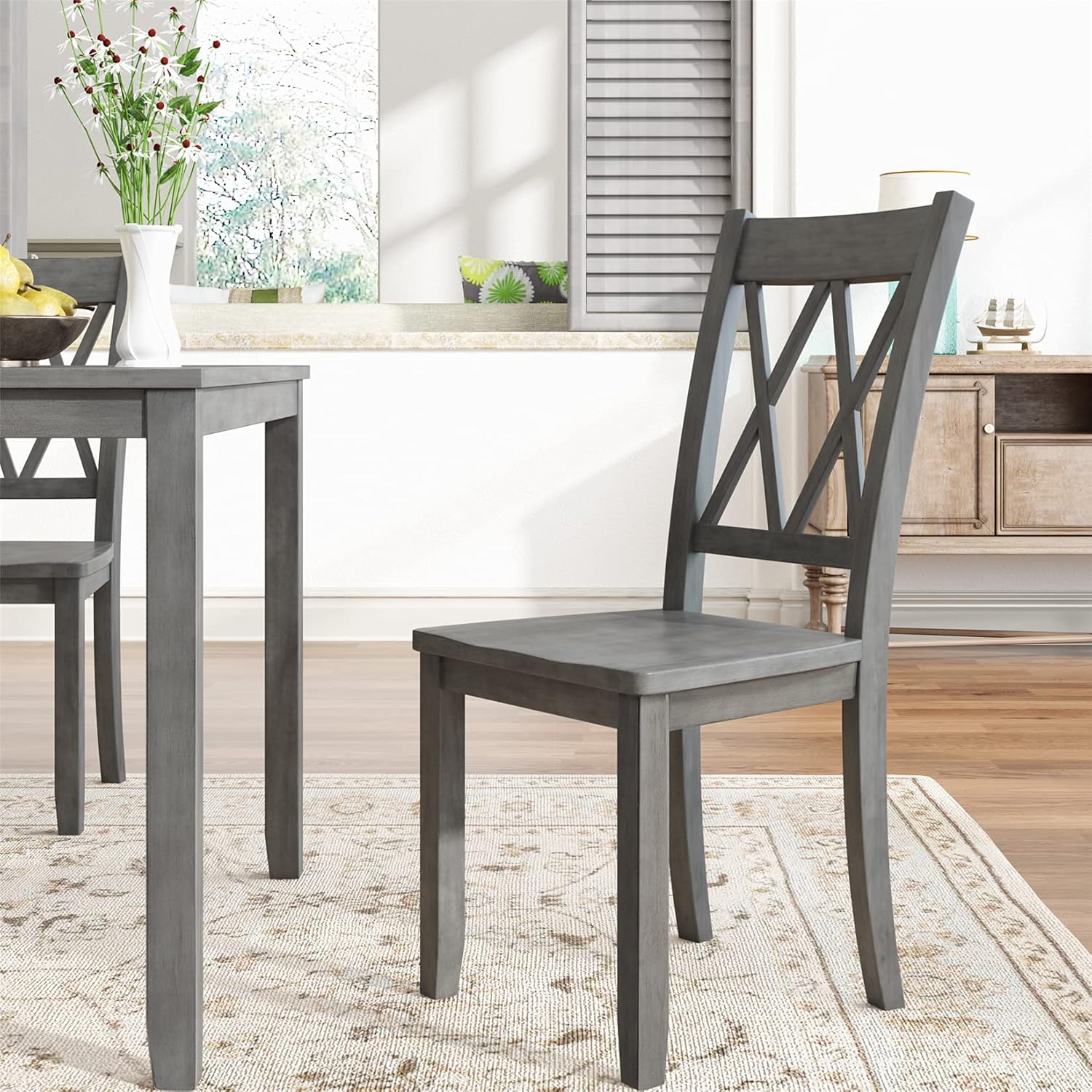 Close-up of a Bellemave dining chair showing the X-back design