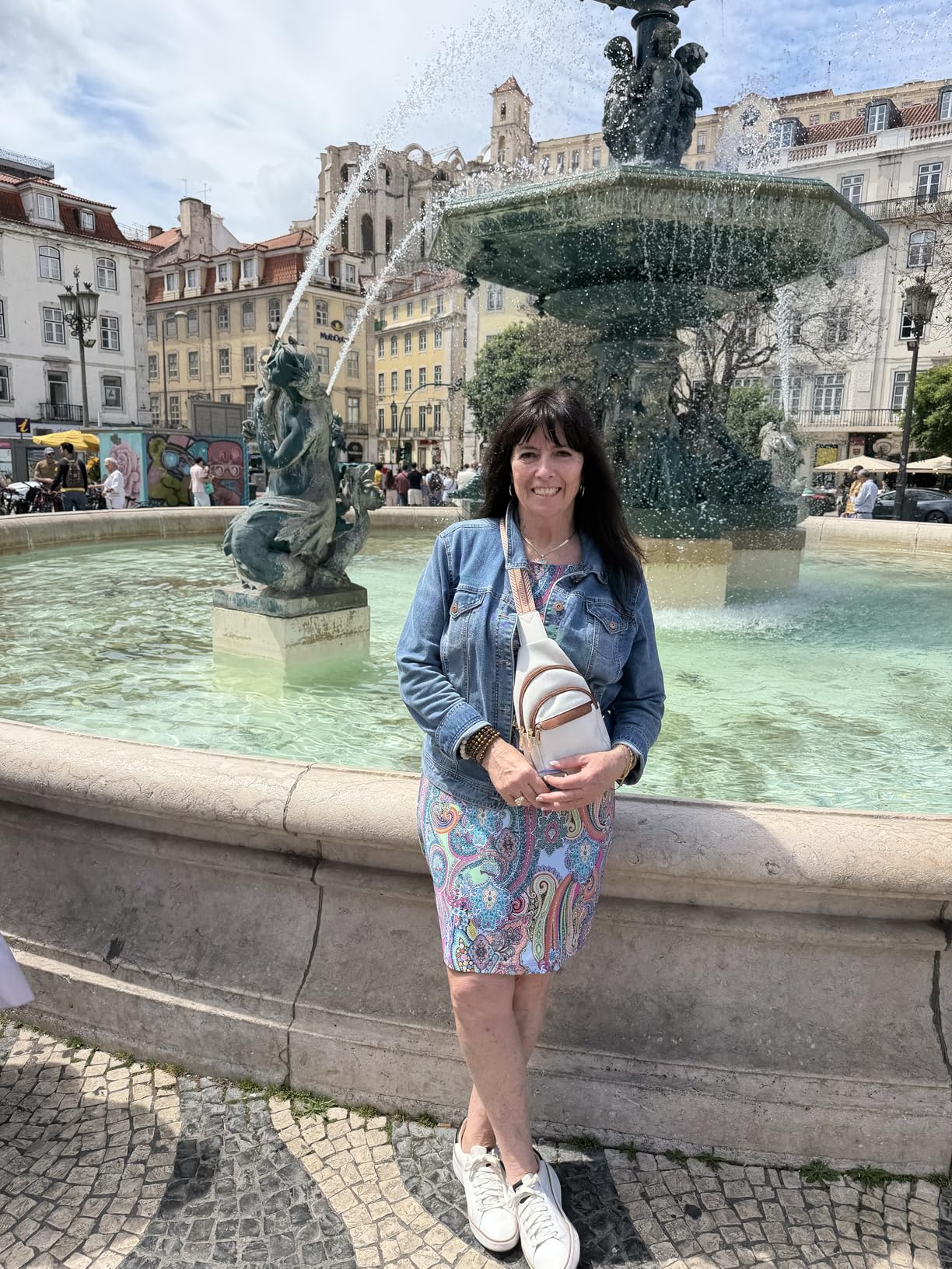 Travel crossbody bag worn while traveling