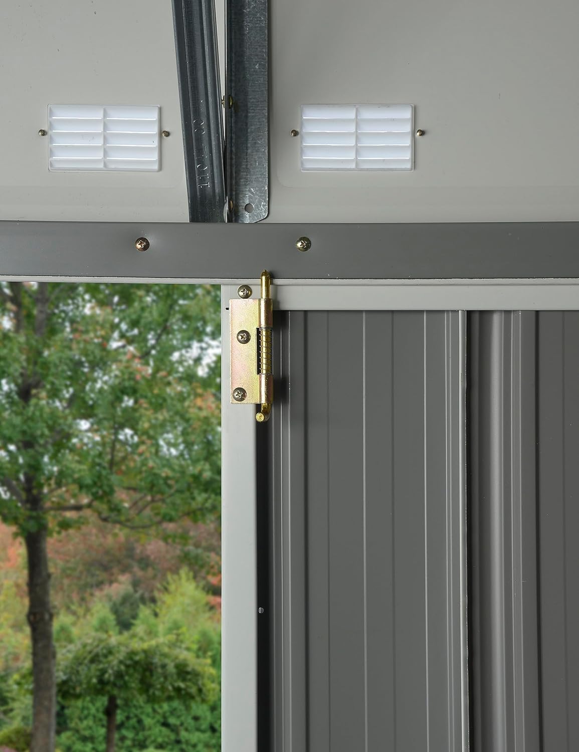 Close-up of the door latch mechanism on the Arrow EZEE Shed