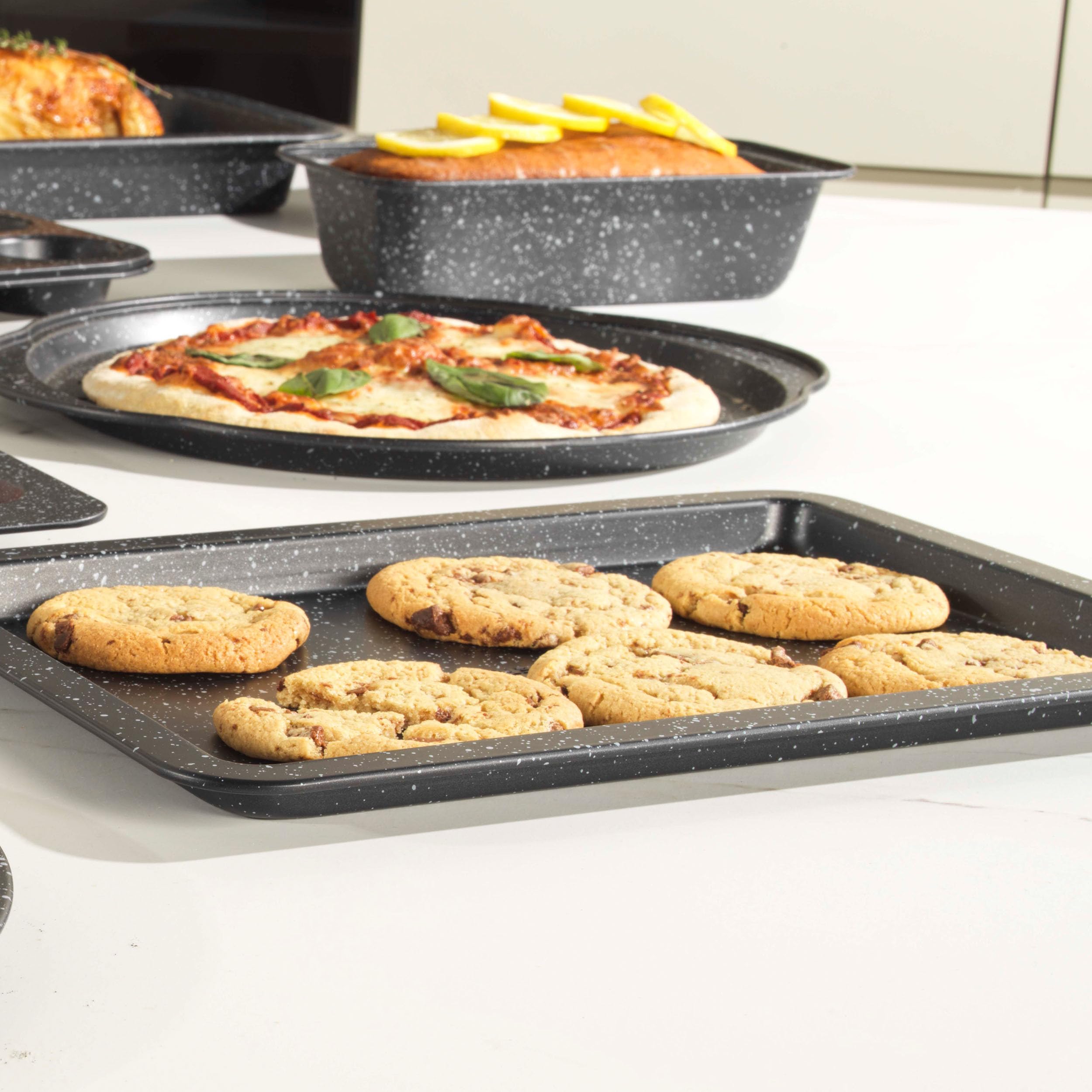 NutriChef Set Teglie da Forno Impilabili 8 Pezzi in Acciaio al Carbonio Antiaderente, Pirofila da Forno, Forno fino a 232 °C, Senza PFOA/PFOS
