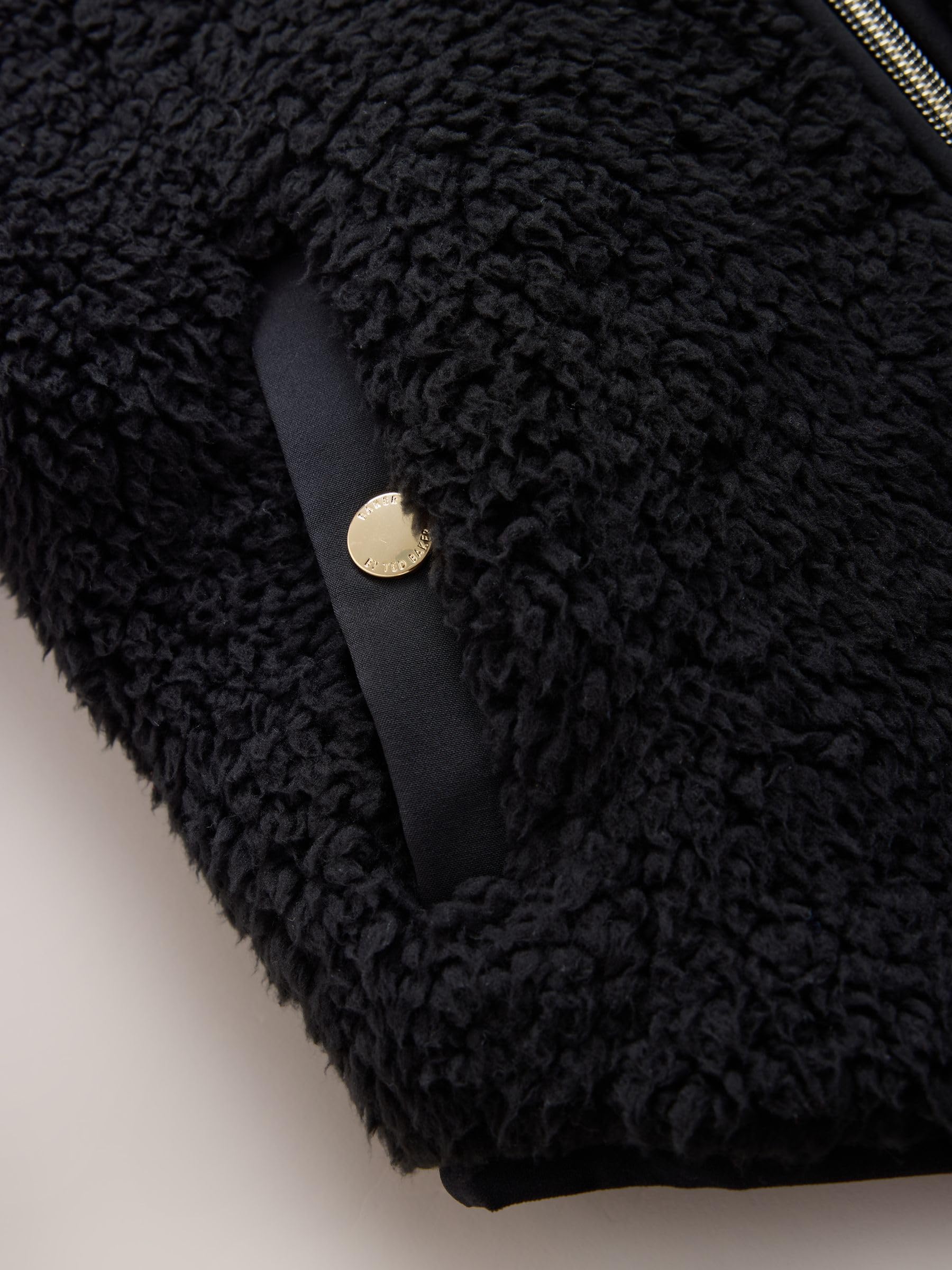 Niñas Polar negro con capucha, cremallera y lazo