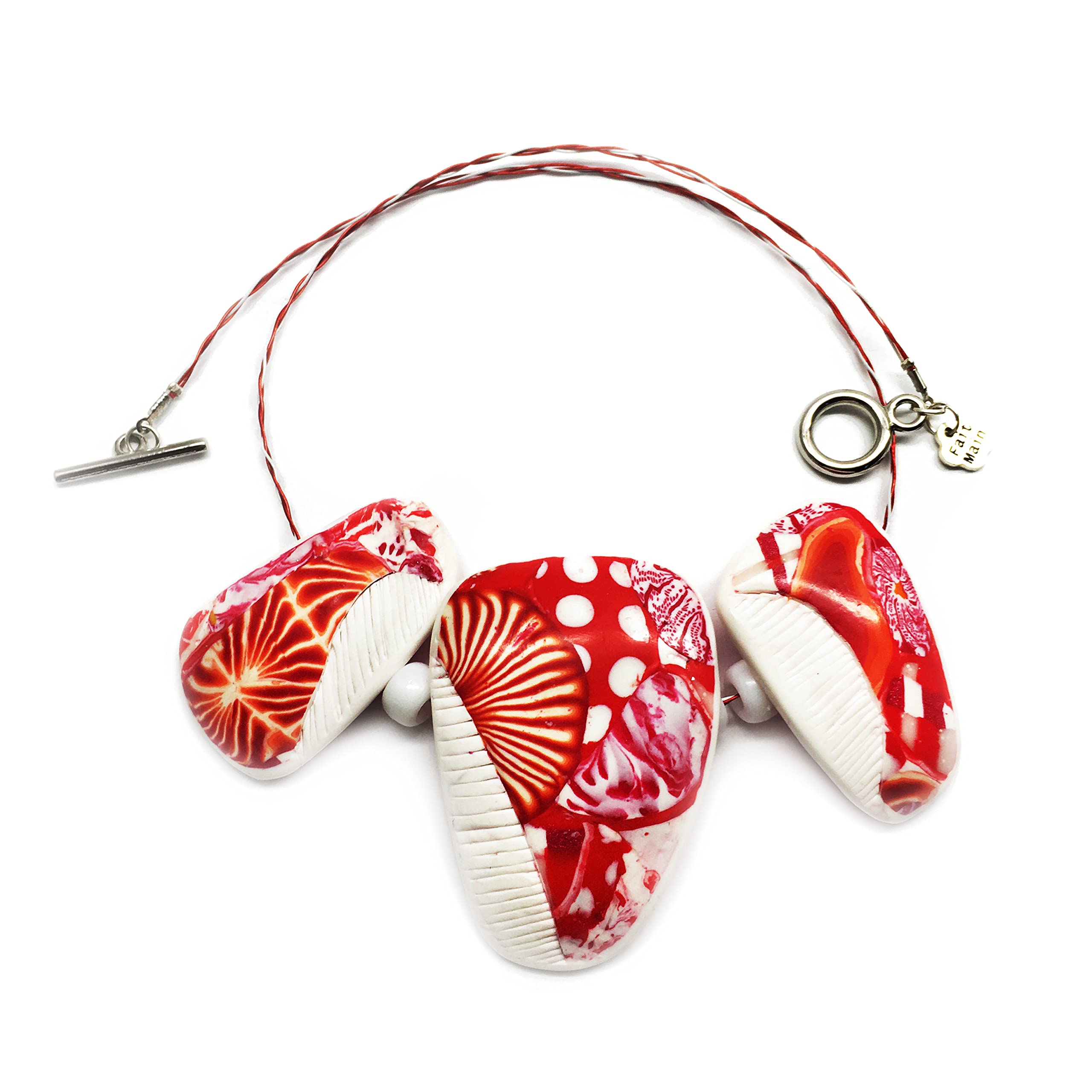 Collier court ras de cou, torque, blanc et rouge, motif artistique abstrait et graphique. Style design, modèle unique pour femme moderne.