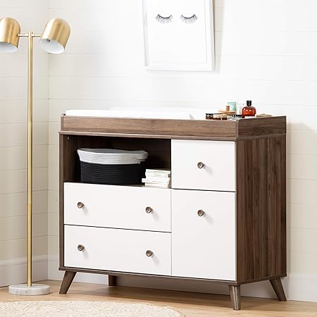 white changing unit with drawers