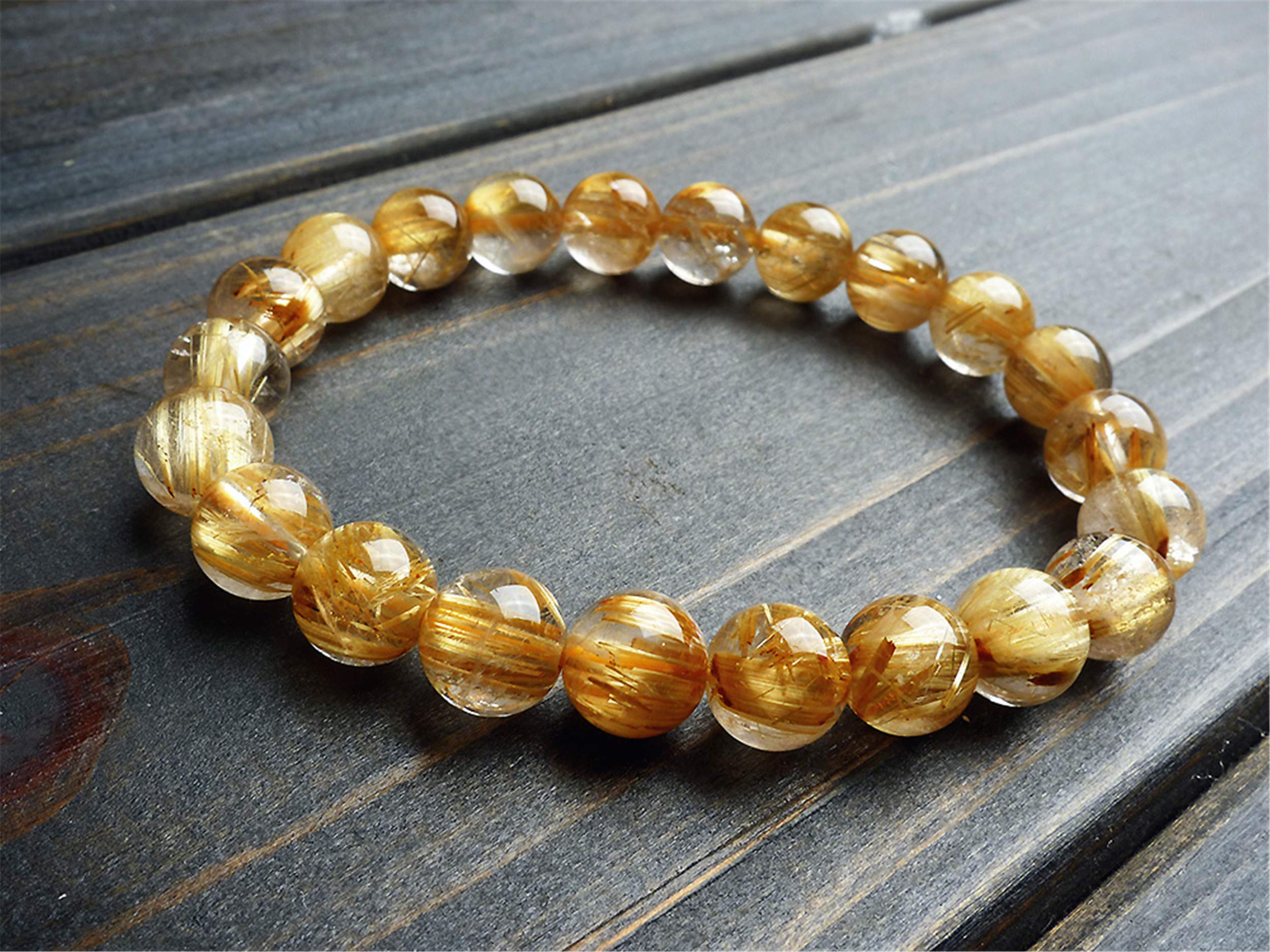 Bracciale elasticizzato con perline rotonde di cristallo di quarzo rutilato giallo naturale da 9 mm AAA