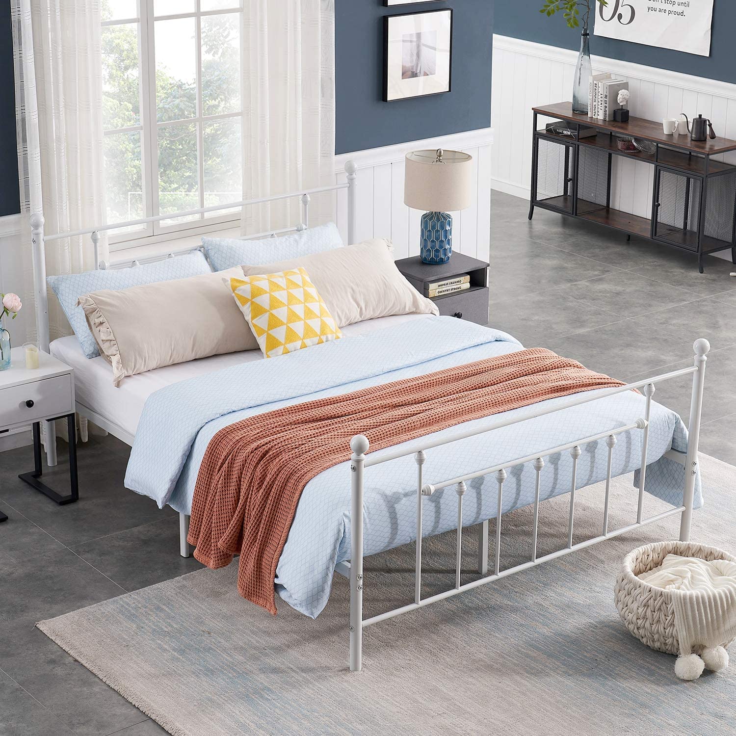 A white VECELO Full Size Metal Platform Bed Frame with a Victorian style headboard and footboard, shown in a bedroom setting.