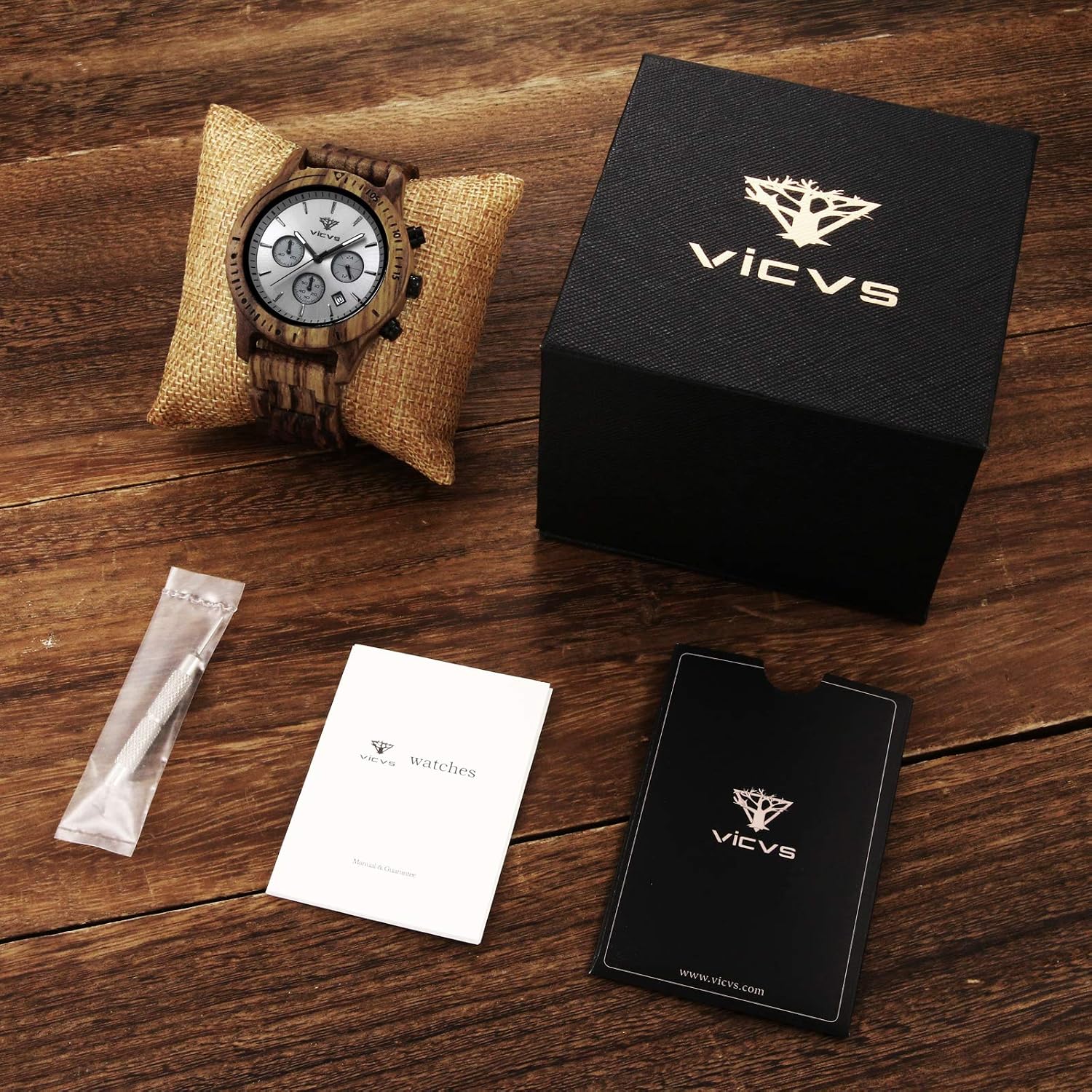 Orologio da uomo in legno VICVS, orologio da uomo Pterocarpus soyauxii in  noce nero, cronografo multifunzione con cinturino in legno, adatto a  qualsiasi polso (Zebra) : Amazon.it: Orologi