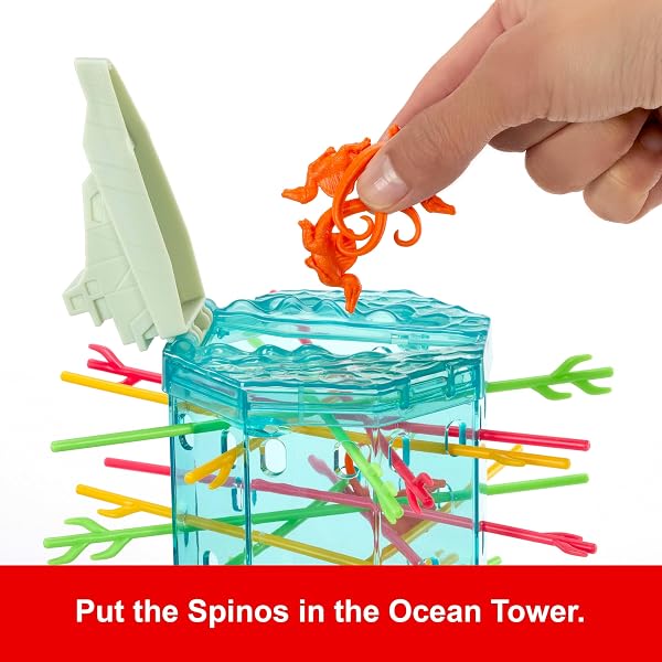 A close-up view of the Spinosaurus figures resting precariously on the colourful sticks within the KerPlunk Ocean Tower.