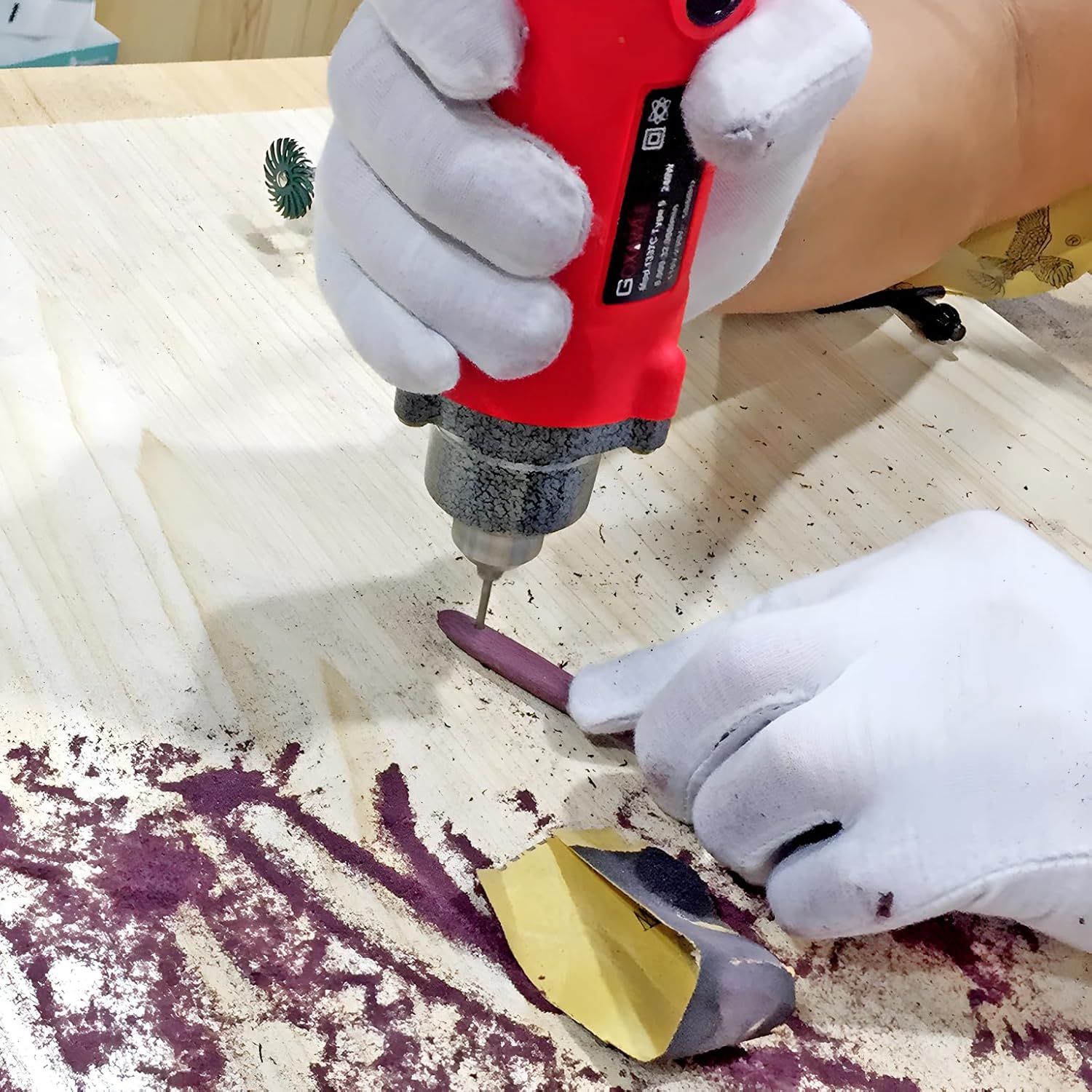 Rotary tool engraving a design onto a surface
