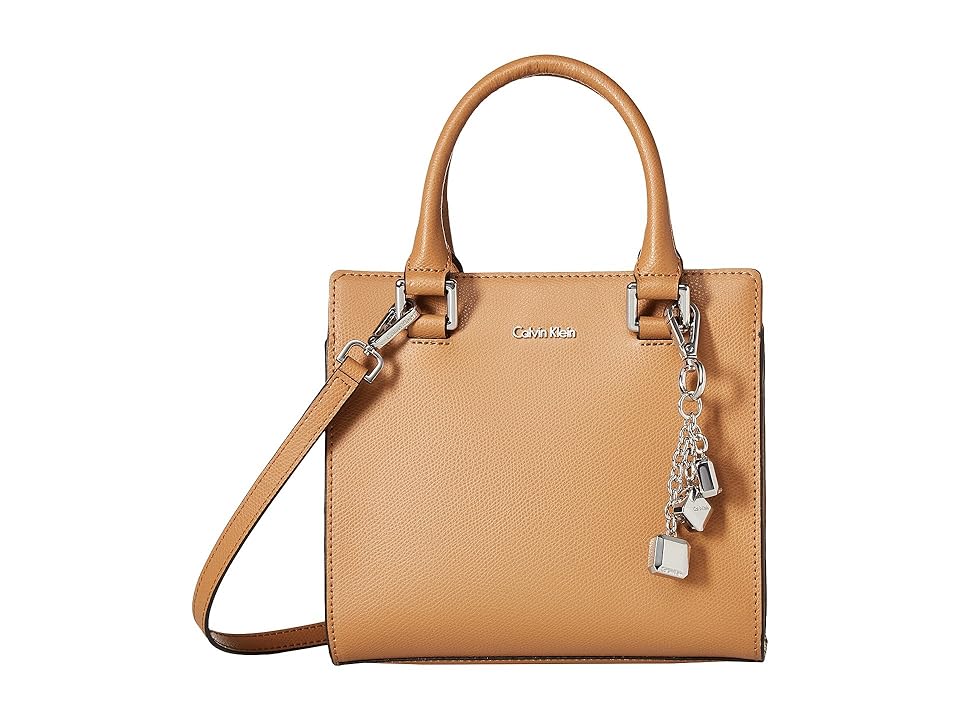

Calvin Klein Mercury Crossbody (Buff) Cross Body Handbags, Tan