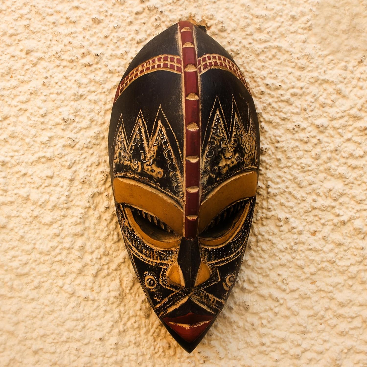NOVICA Light Brown Handcrafted Nigerian Wood Wall Mask with Aluminum Accents, 'King's Companion'