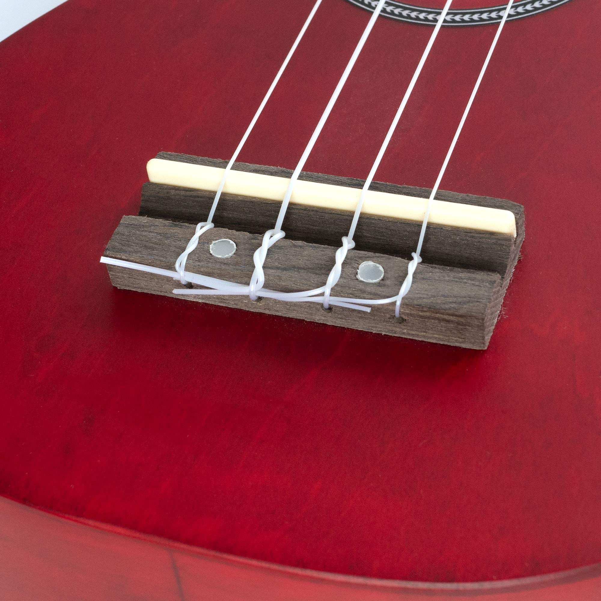 CASCHA Sopran Ukulele Set Niederländisch - für Kinder & Erwachsene I Starter Kit mit 3 Plektren Tasche holländisches Lehrbuch mit DVD Stimmgerät I Aquila Saiten Nylon I Kleine Hawaii Gitarre Rot