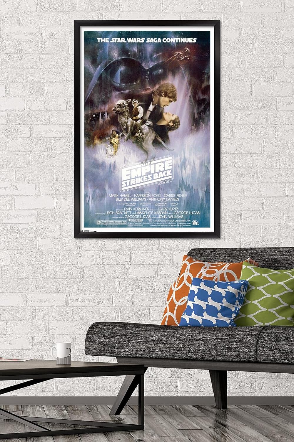 Trends International Star Wars: The Empire Strikes Back - The Saga Continues One Sheet Wall Poster, 22.375" x 34", Black Framed Version