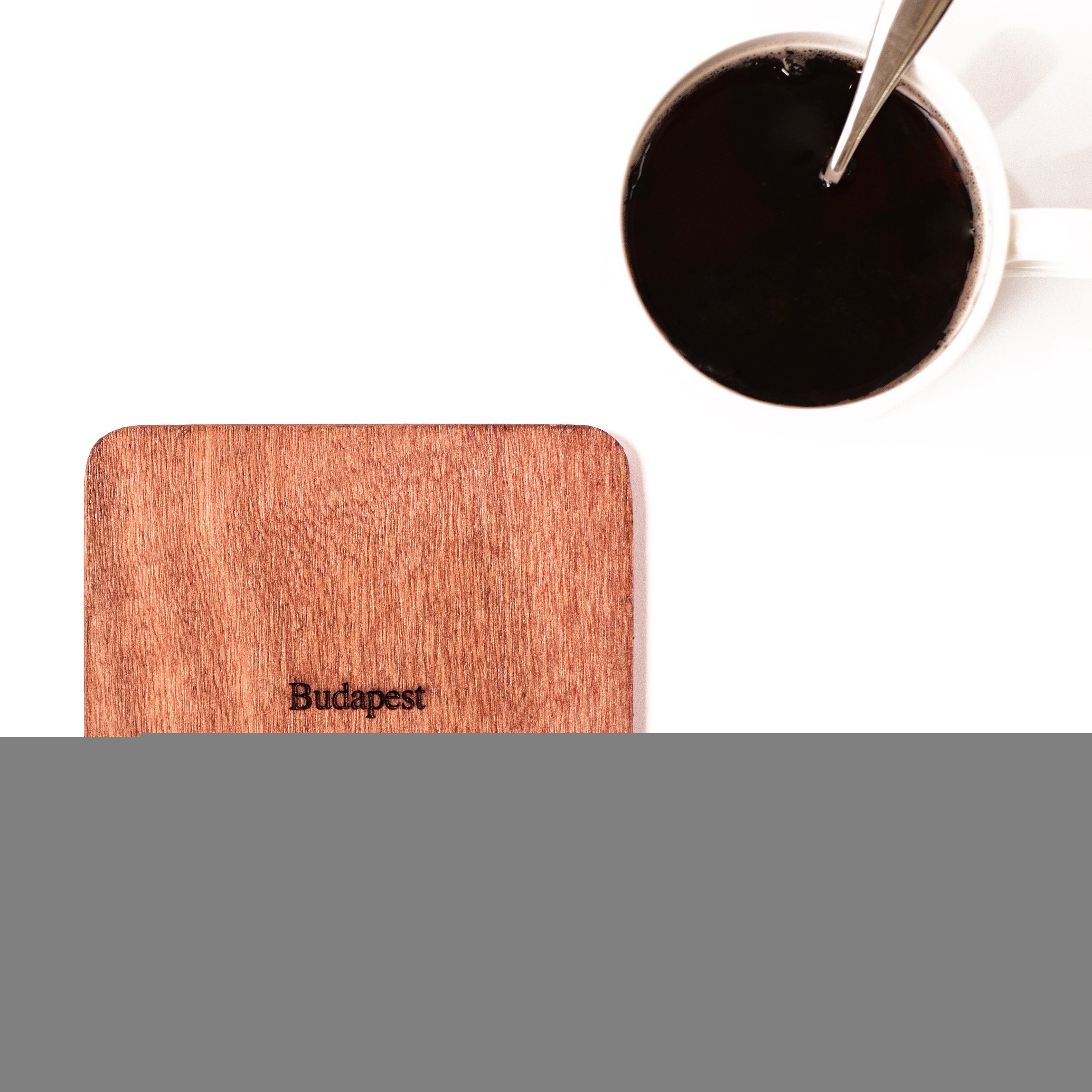Un Sottobicchiere Di Pietra Su Un Sole Di Legno Di Buongiorno Della Lettura Della Superficie Della Tavola 68550799
