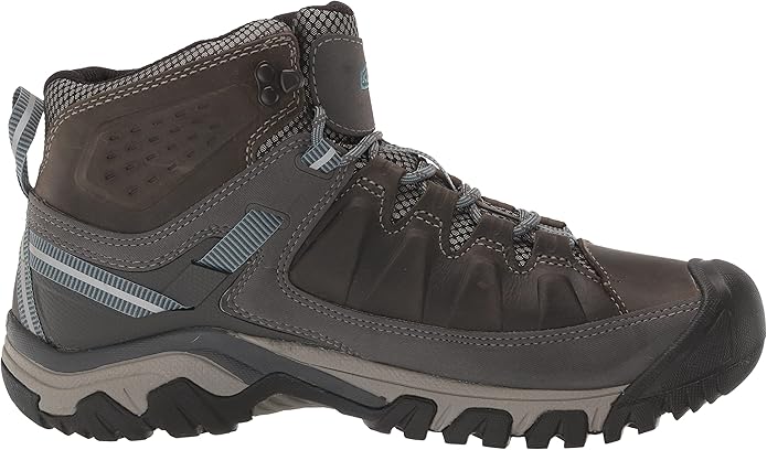 The KEEN Women's Targhee 3 Mid Height Waterproof Hiking Boots are designed to provide stability, protection, and comfort for hiking in various terrain and weather conditions. These boots feature a waterproof membrane that repels water while allowing moisture to escape, keeping your feet dry and comfortable. The leather and mesh upper offers durability and breathability, while the mid-height design provides ankle support and protection.