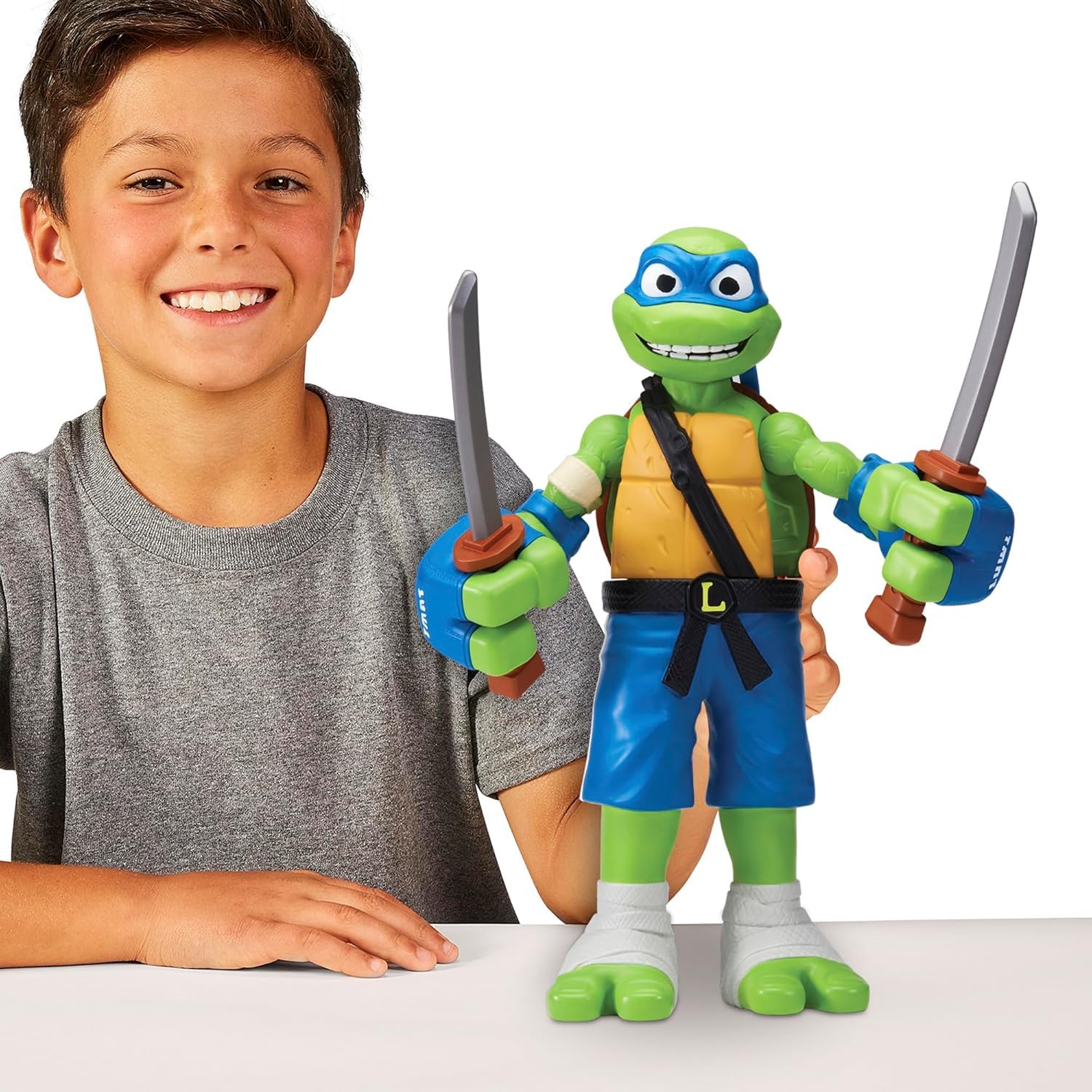 Giochi Preziosi -Leonardo Tortugas Ninja Caos mutante Rolling Punch, Leonardo Personaje Gigante 30 cm con Fución Combate y Arma Incluida, para Niños a Partir de 4 Años