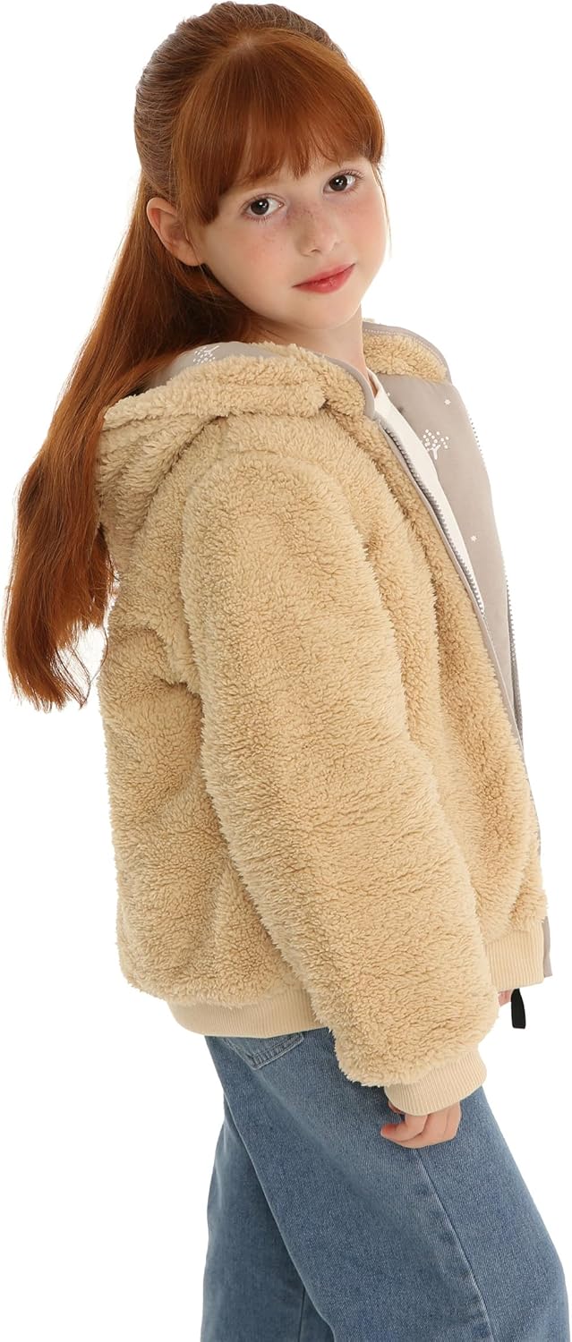 Toddler Girl Models Reversible Fleece Coat in Soft Tan