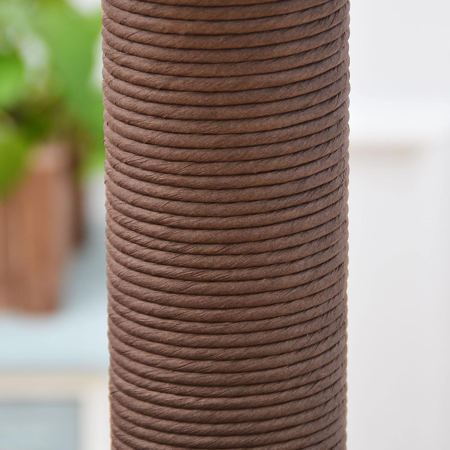Close-up of a hanging feather toy