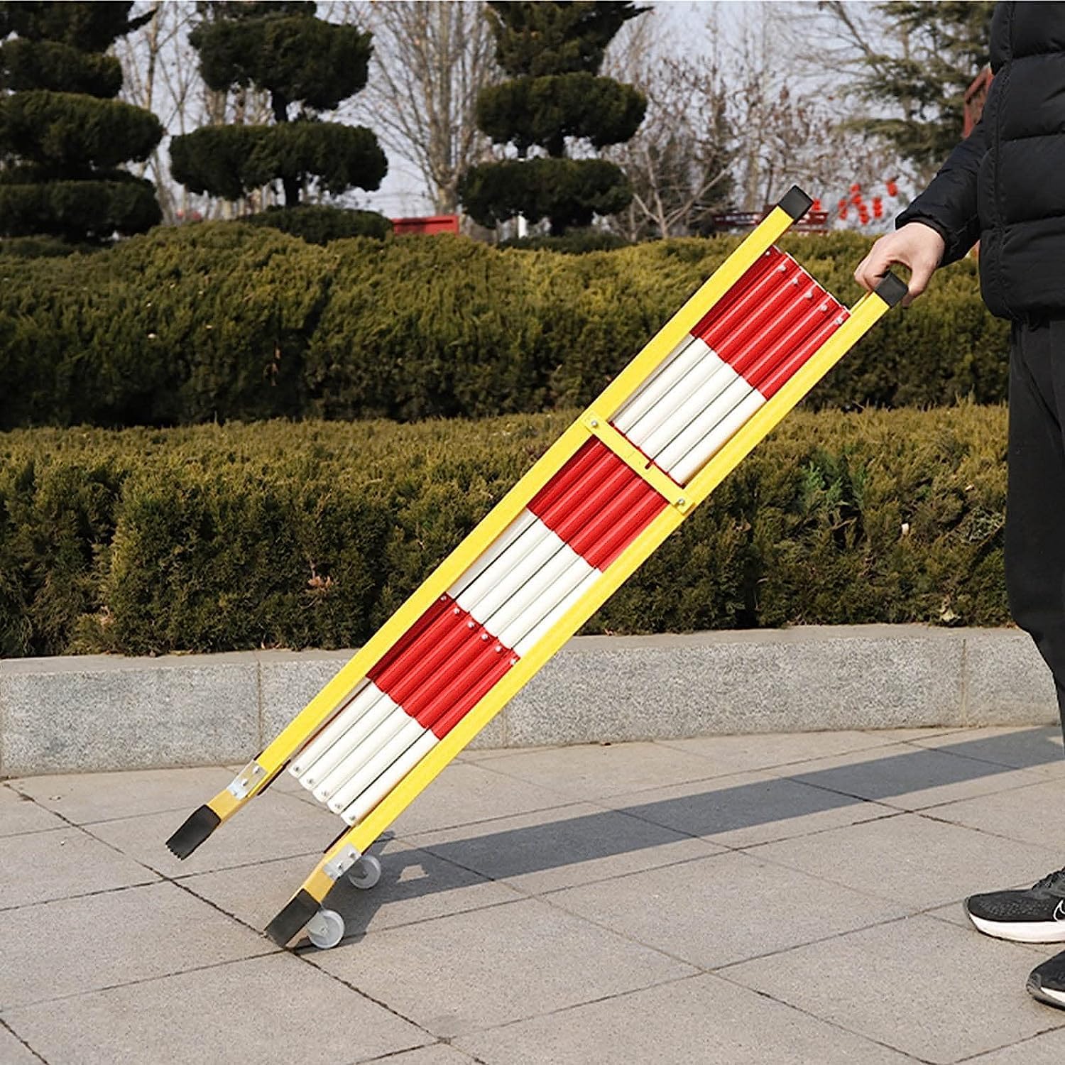 Barrera de seguridad móvil, control de tráfico retráctil, barrera de concertina portátil ajustable para una gestión eficaz del espacio, ideal para eventos y control de multitudes