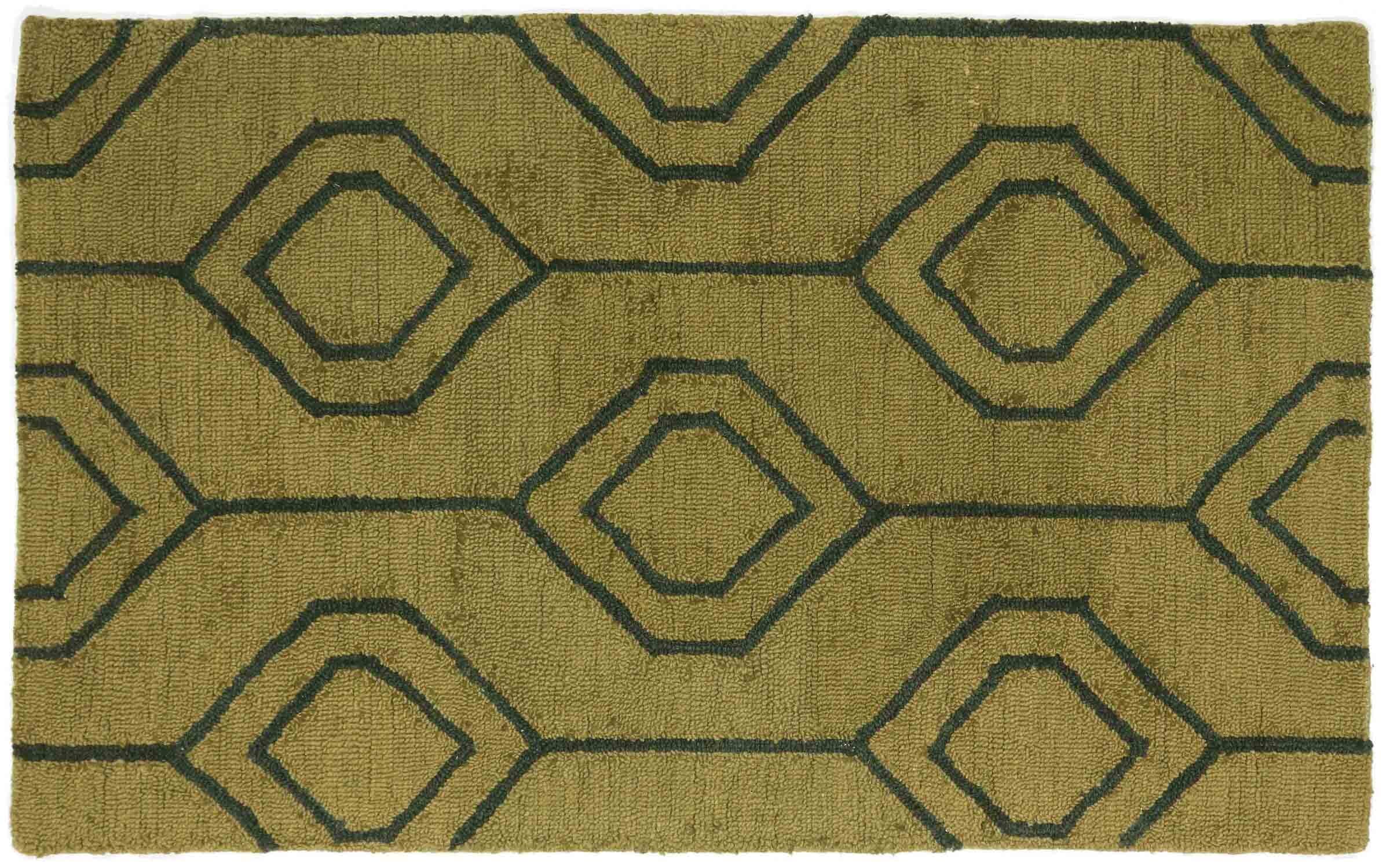 Tapis en laine vierge vert fait main pour une ambiance chaleureuse et sereine