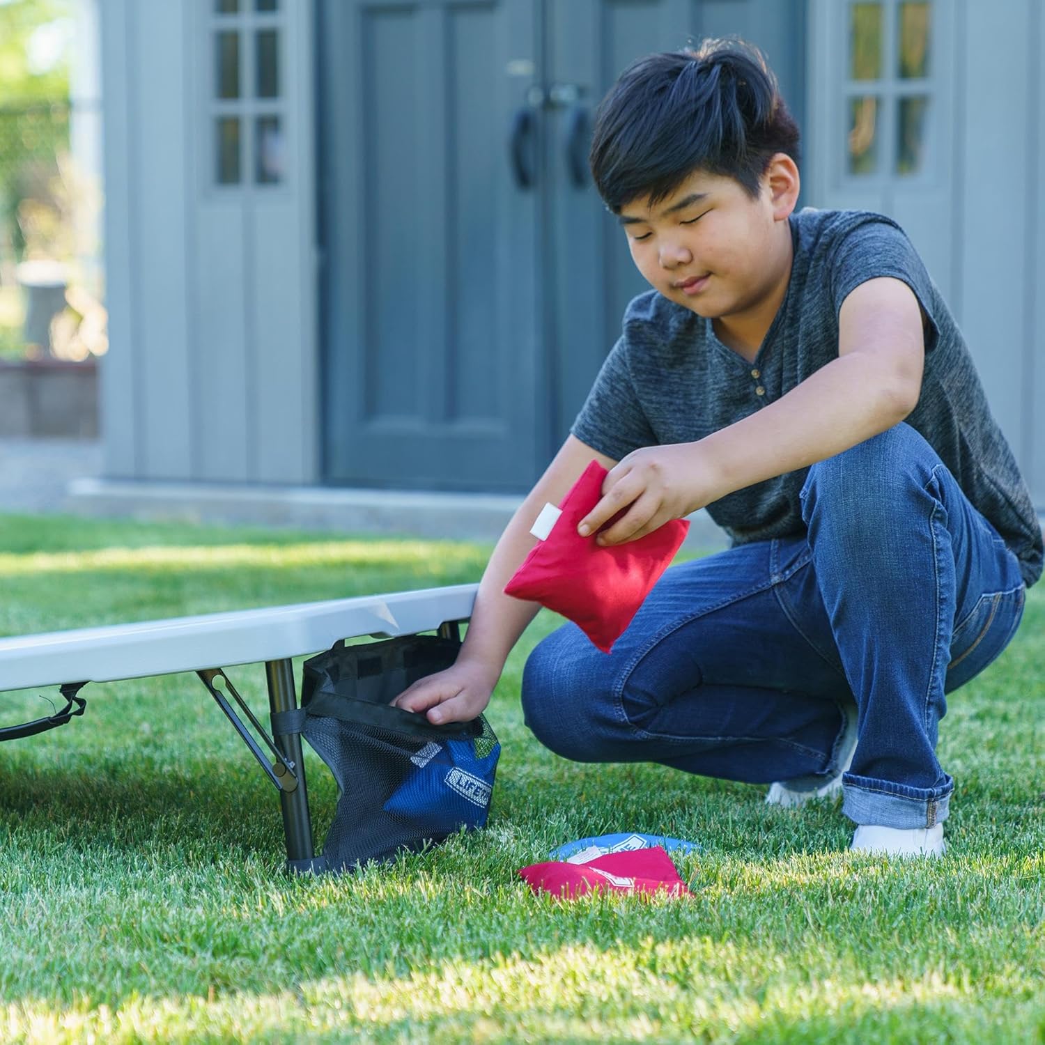 Lifetime Portable Cornhole Toss Game Set with 8 Bean Bags and Storage Pouches Attached to Boards