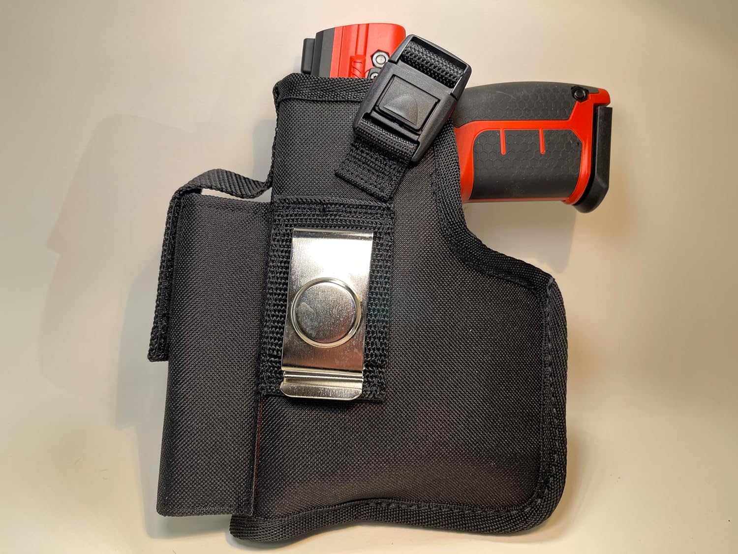 Holster Compatible to fit The Byrna Model LE with an Optional Laser/Light Added Also has an Extra Magazine Pocket to Hold The Extra Mag.
