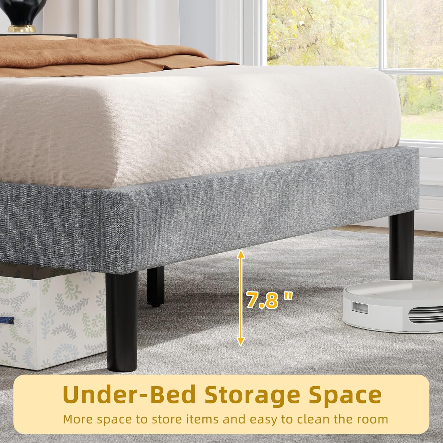 Image showing the 7.8 inch under-bed storage space with a robot vacuum cleaner and storage bins.