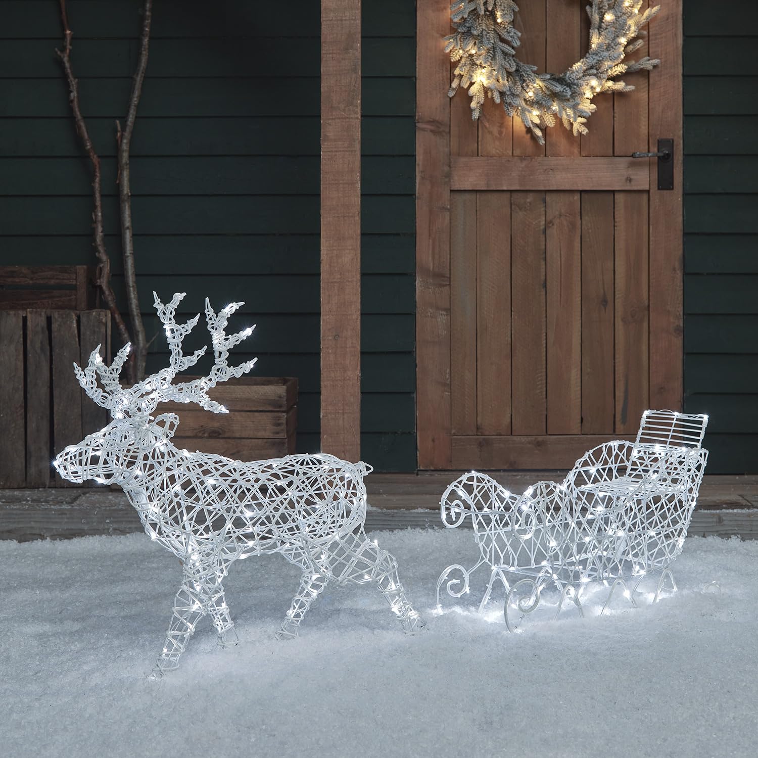 Lights4fun 3-in-1 LED Rentier mit Schlitten Beleuchtet 70cm Hirsch Figur Timer Weihnachtsbeleuchtung Außen und Innen Batteriebetrieb