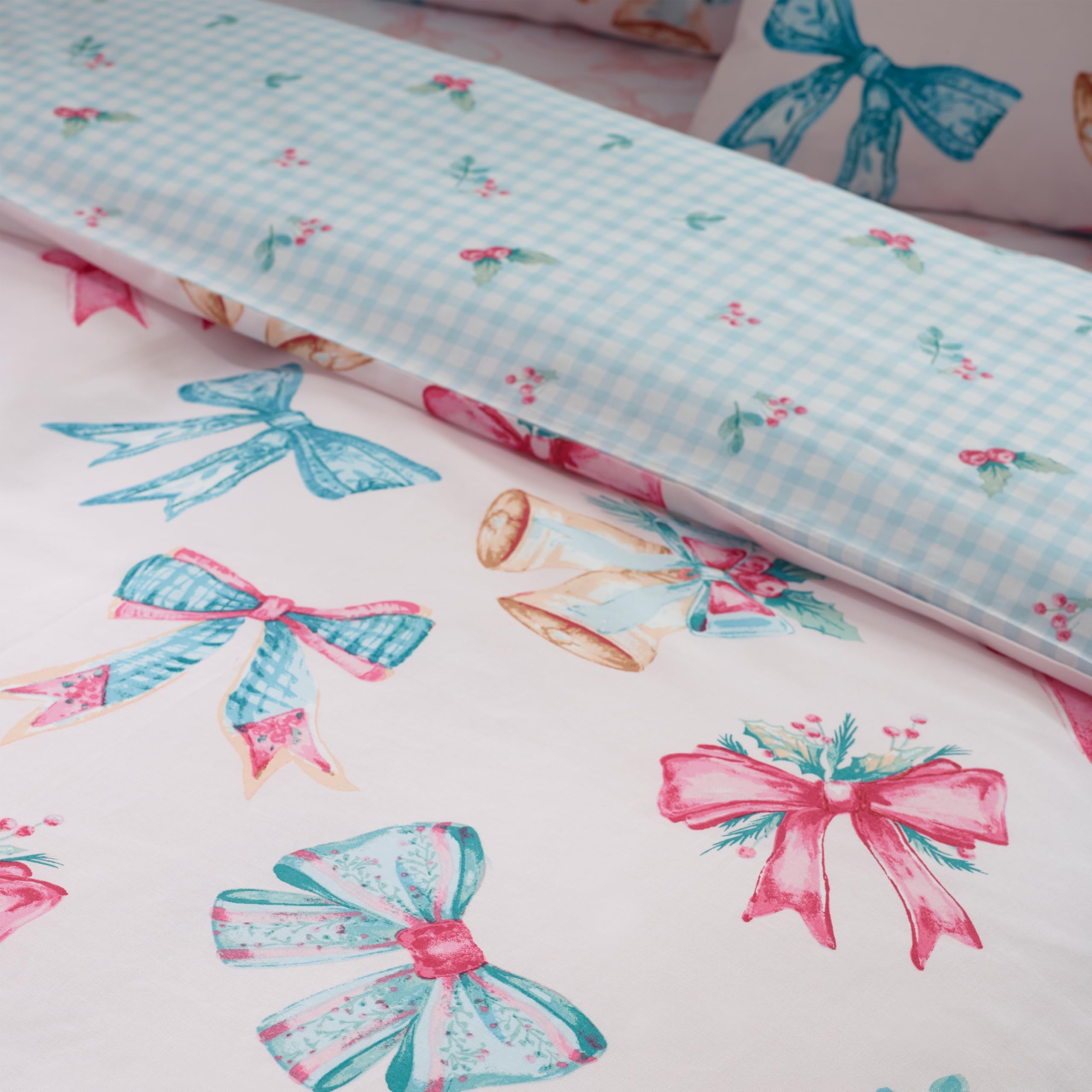 Catherine Lansfield Parure de lit réversible avec taies d'oreiller et nœuds de Noël pour lit King Size Rose