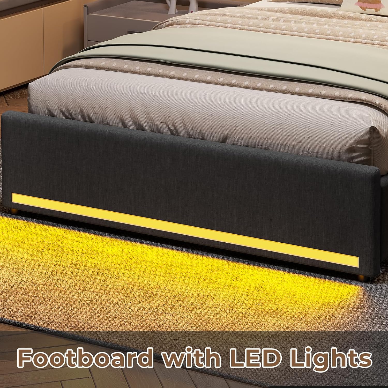 Close-up of the footboard with LED lights glowing yellow, casting light onto the floor.