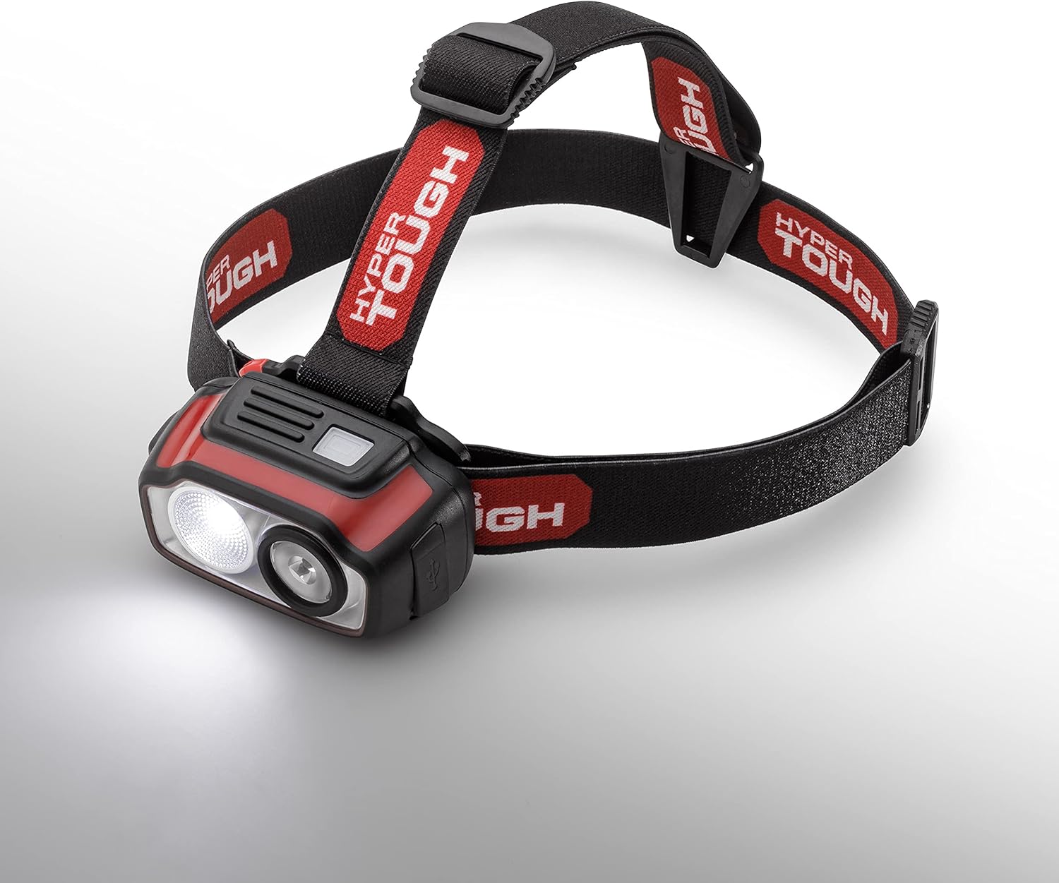 Hyper Tough headlamp illuminated in Flood High mode, showing a wide, diffused light