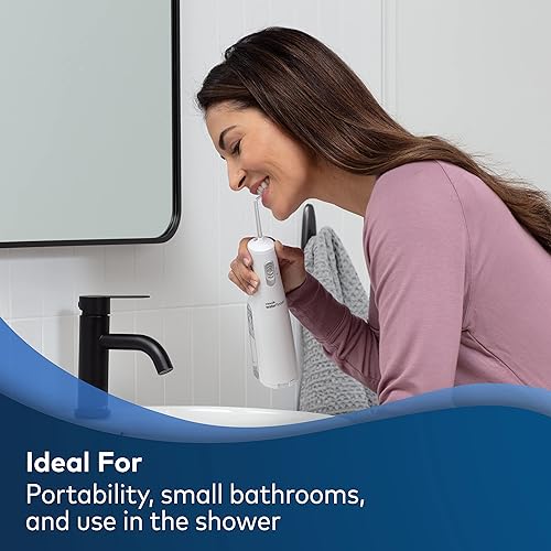 Miniatura 6 de Waterpik Irrigador dental para dientes, compacto eléctrico portátil para viajes y hogar, Nano Plus, WP-320, blanco, 1 unidad (paquete de 1) e hilo