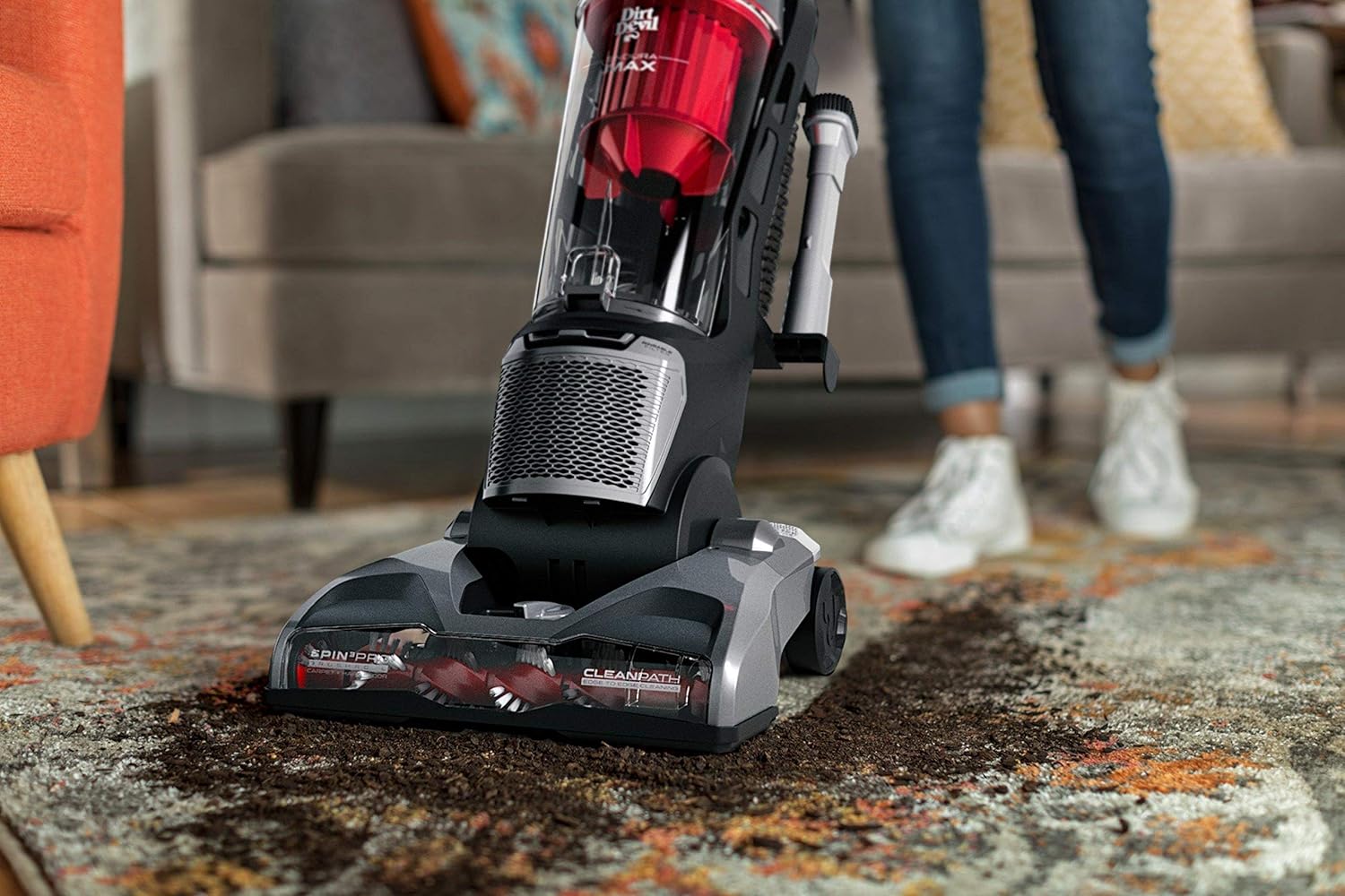Dirt Devil Endura Max vacuum cleaning debris from a carpet