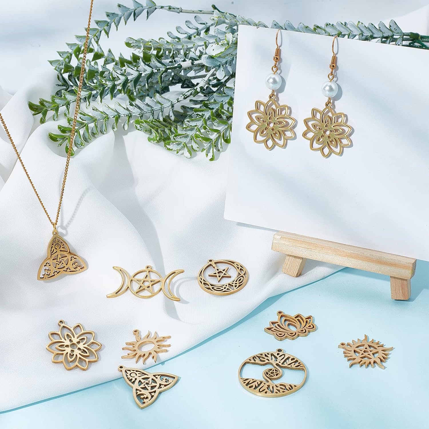 SUNNYCLUE 1 Box 16Pcs Tarot Style Sun Charms Celtic Trinity Knot Charm 18K Gold Plated Stainless Steel Lotus Charm Triple Goddess Moon Ouijas Double Sided Hollow Flower Charms for Jewelry Making Charm