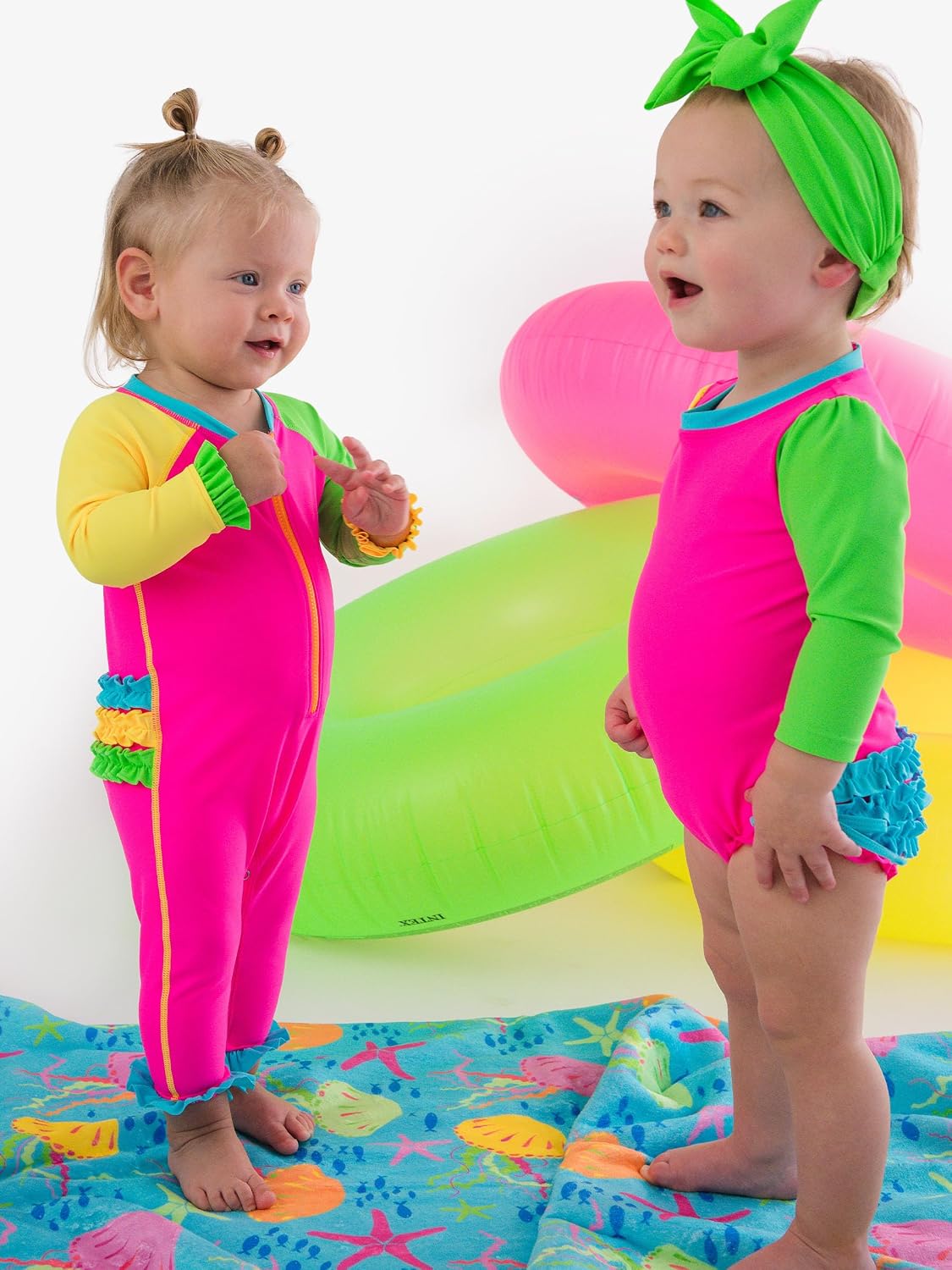 RuffleButts Baby Girls UPF50+ Sun Protected Full Length Long Sleeve Rash Guard One Piece Swimsuit