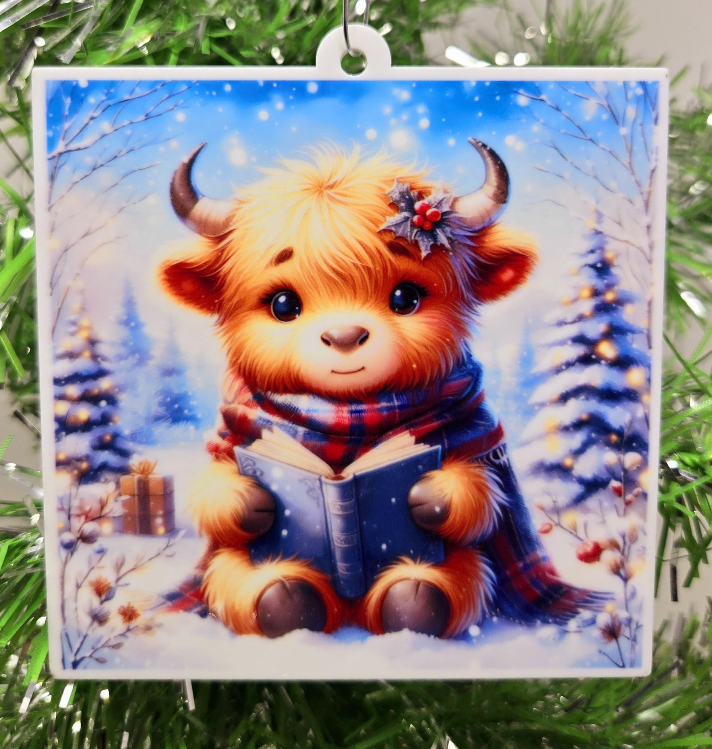 Vache Highland déco de Noël lecture pour embellir votre bibliothèque festive