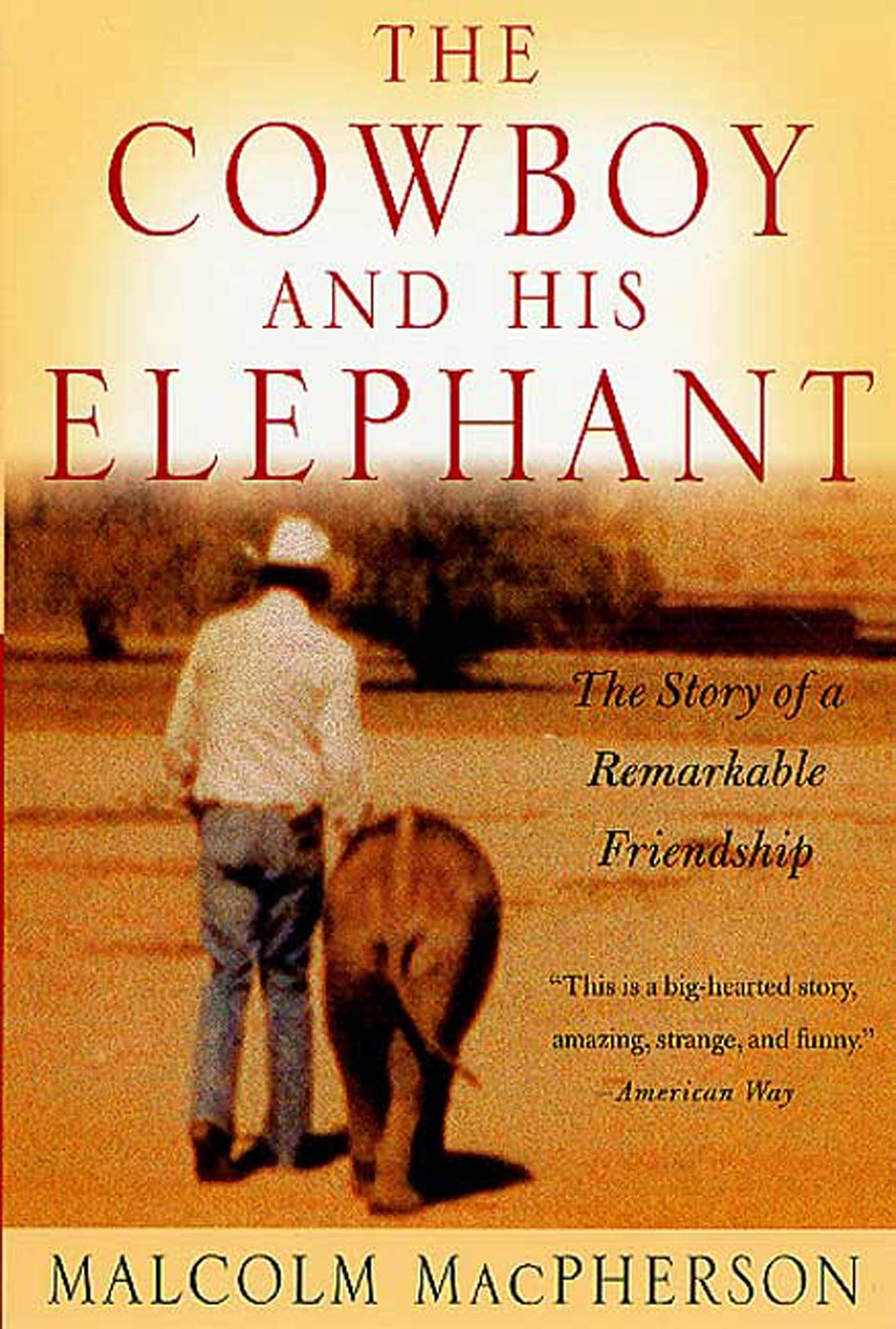 The Cowboy and His Elephant: The Story of a Remarkable Friendship Paperback – September 3, 2002