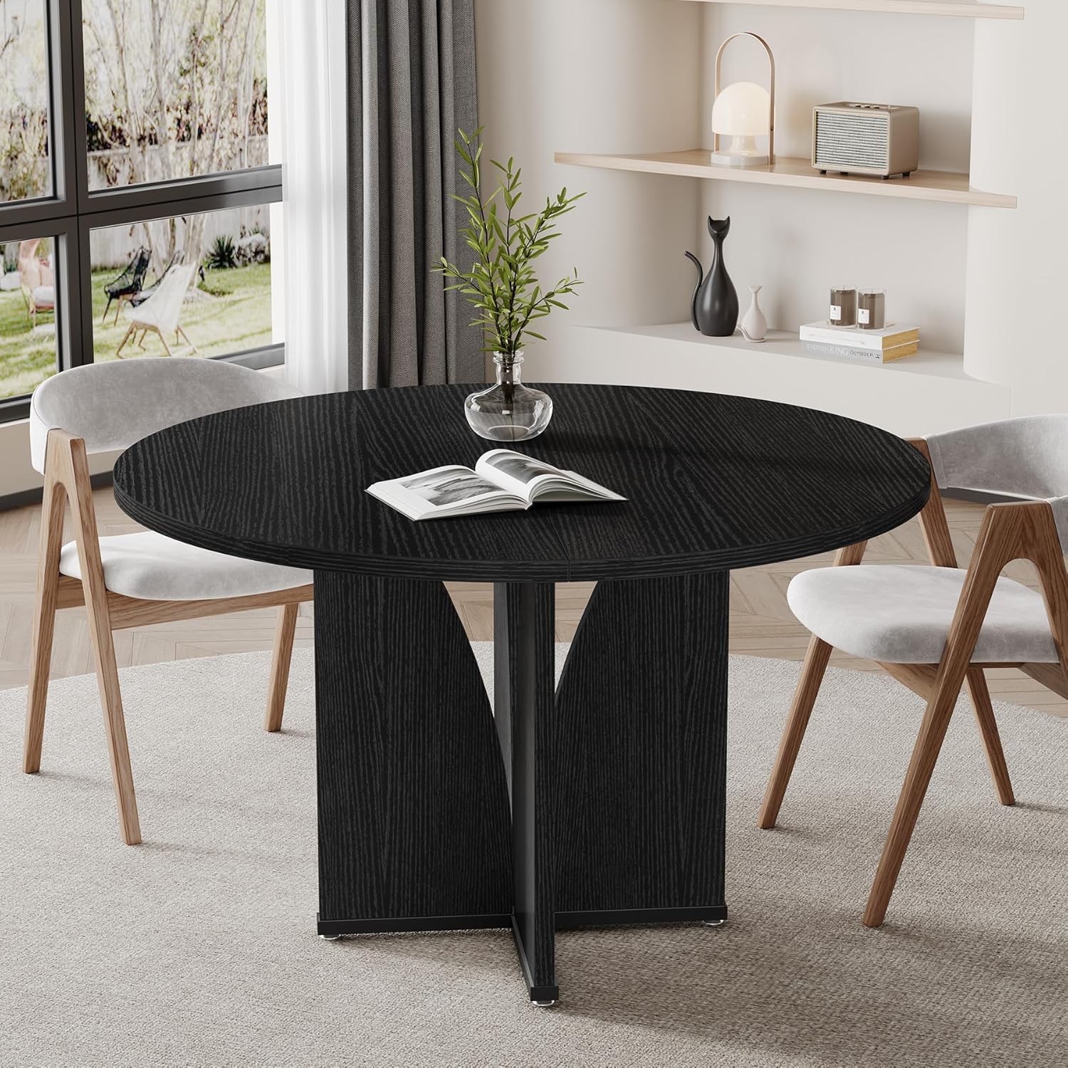 Part inferior view of the Tribesigns Round Dining Table showing the assembled tabletop sections and the central support structure with screw holes.